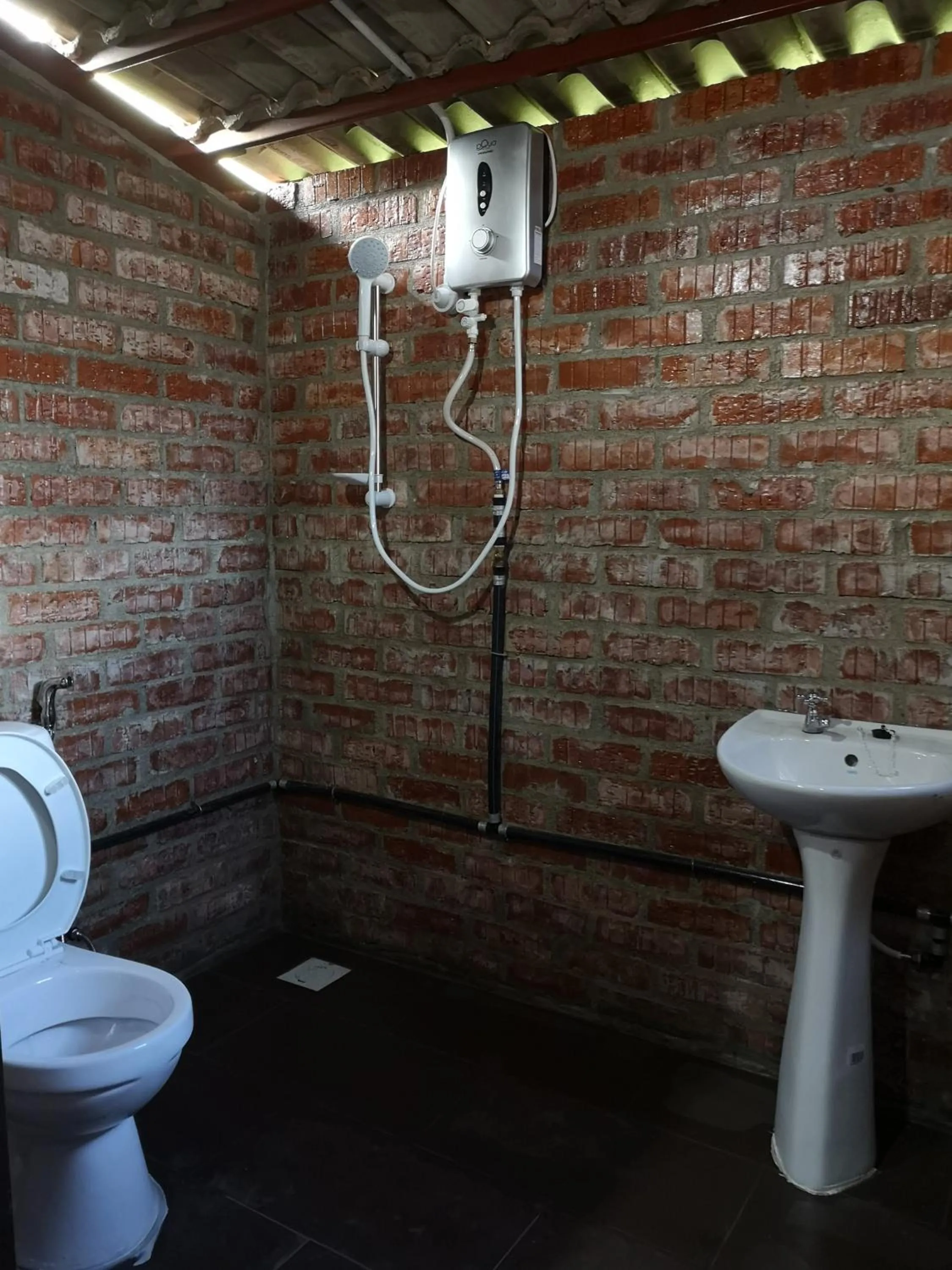 Bathroom in Kenyalang Urban Homestay