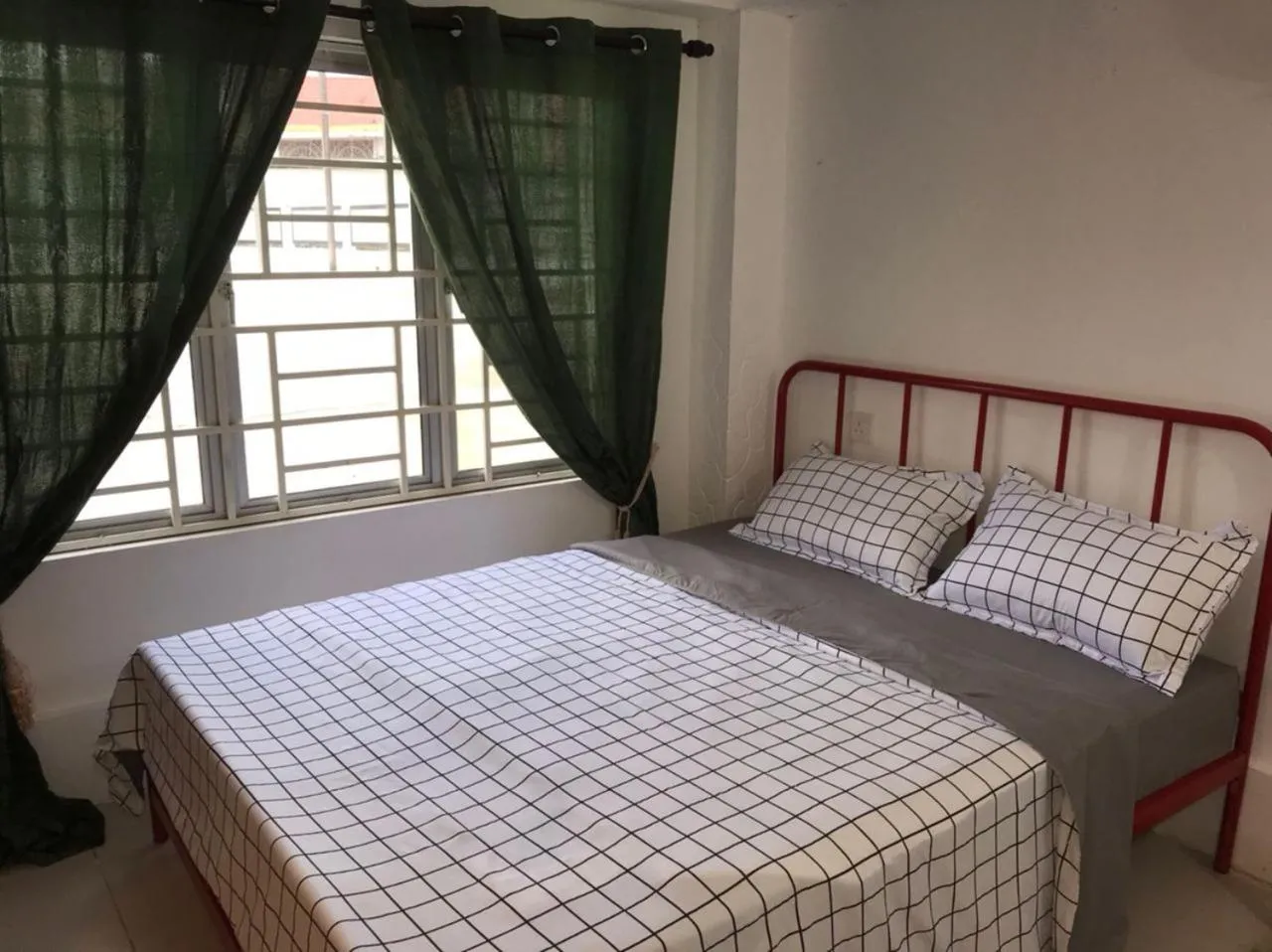 Bed in Kenyalang Urban Homestay