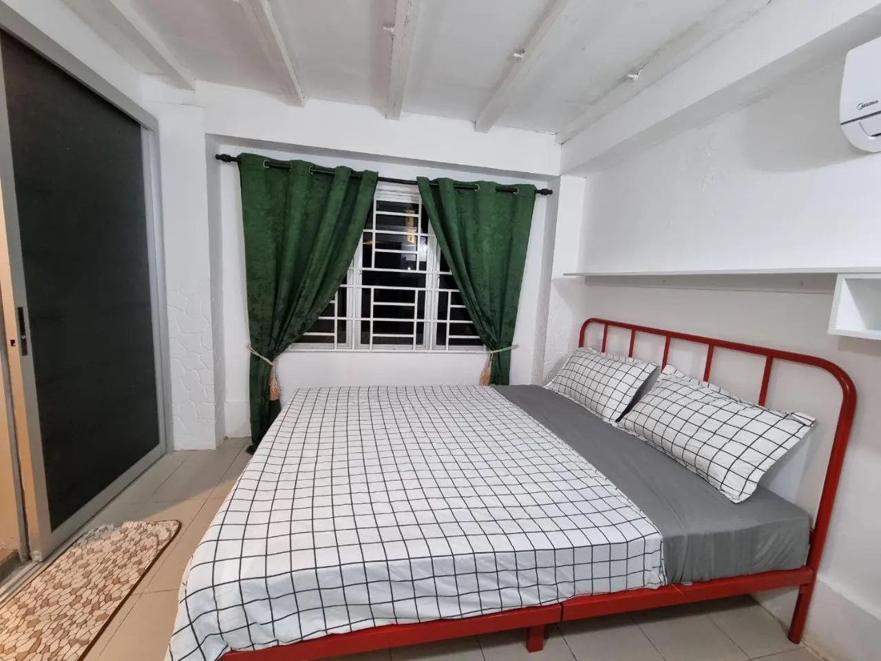 Bed in Kenyalang Urban Homestay