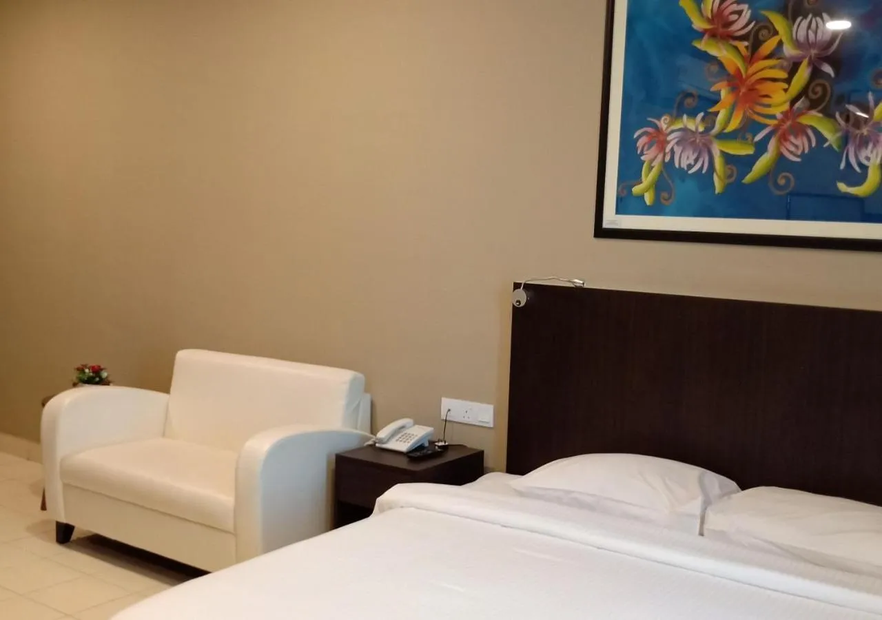 Seating area, Bed in Hotel Desaru Penawar