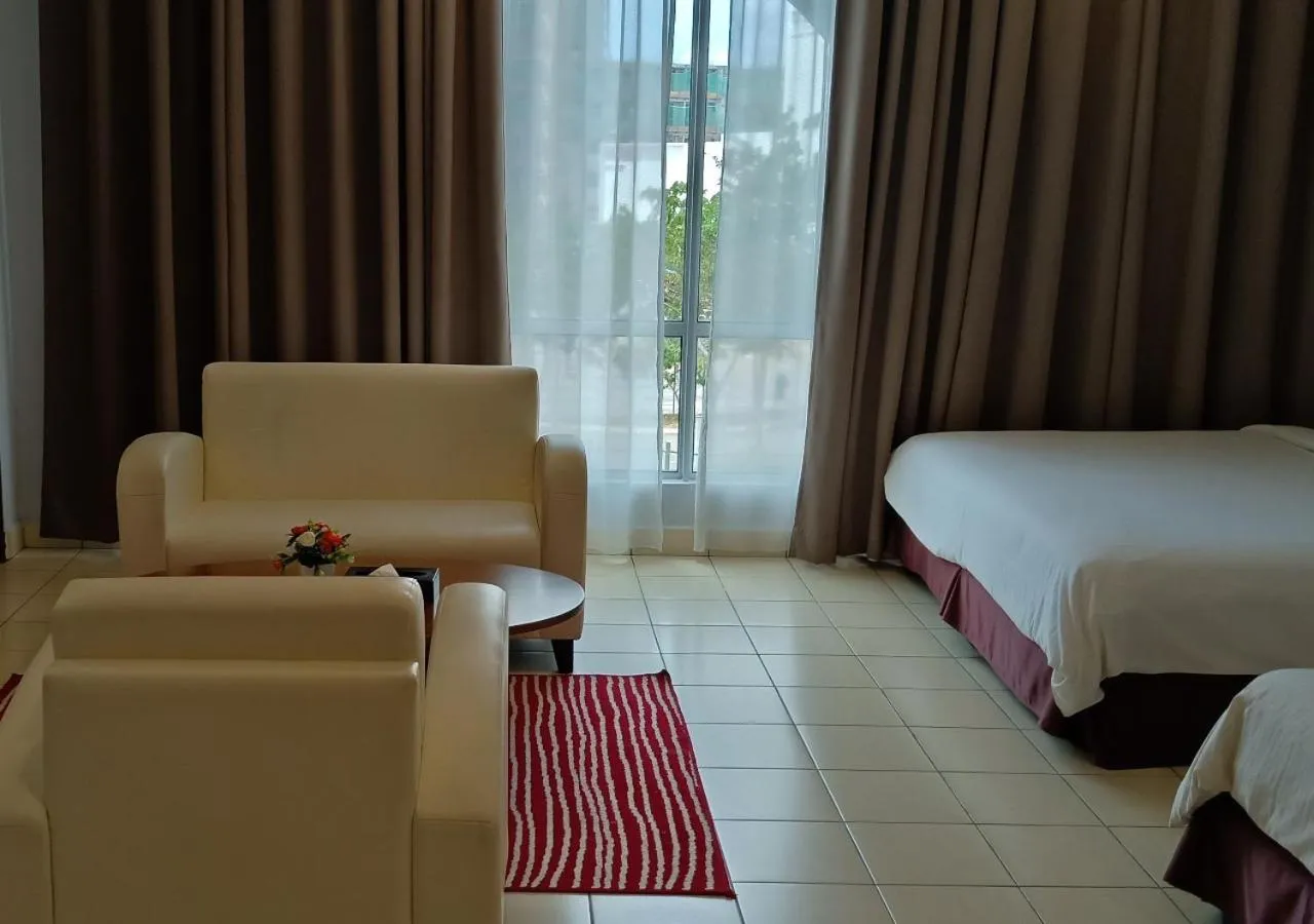 Living room, Bed in Hotel Desaru Penawar