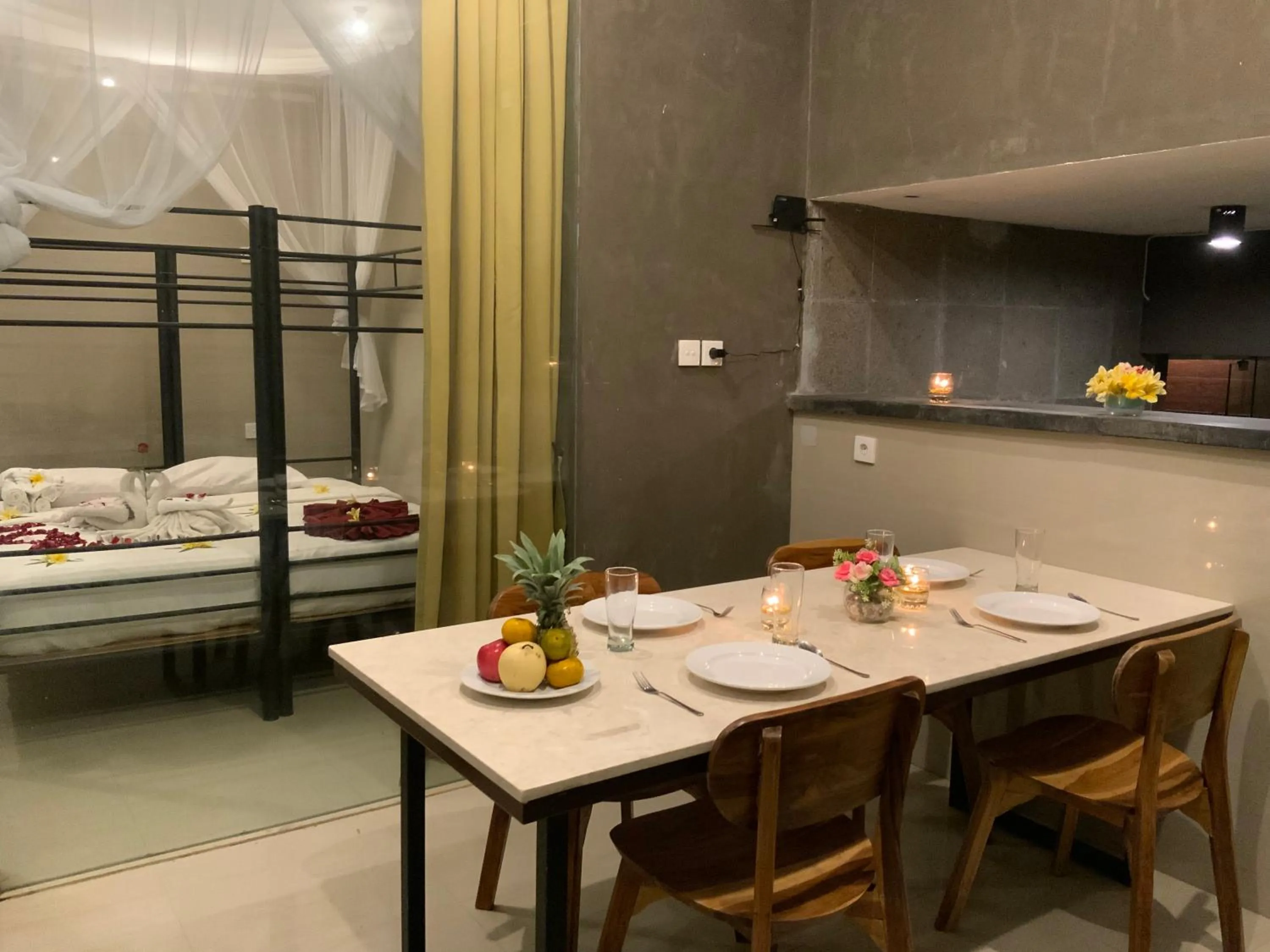 Dining area, Bed in Bali Golden Elephant Boutique Villa