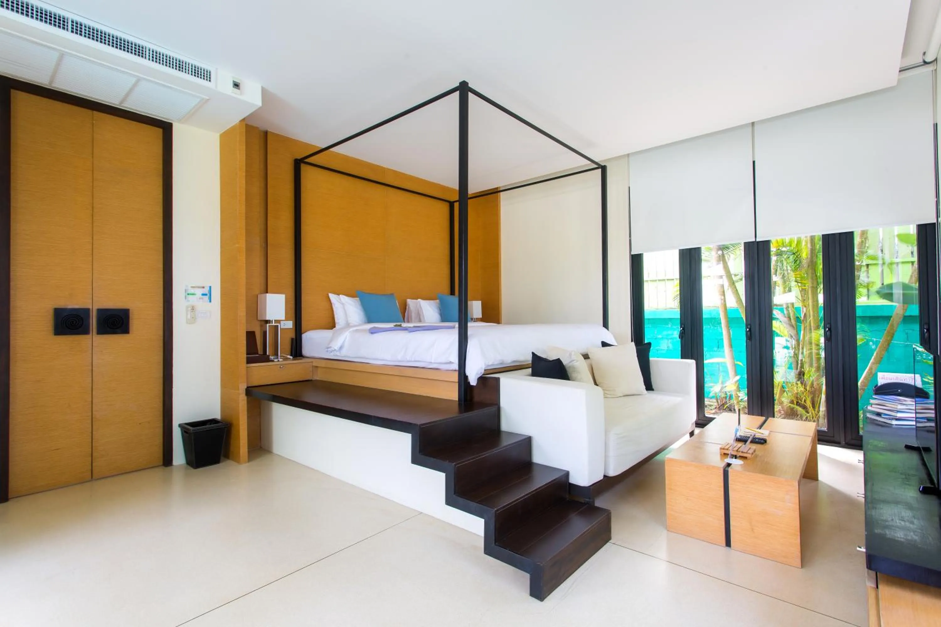 Photo of the whole room, Bed in The Anda Mani Khaolak Beachfront Villas
