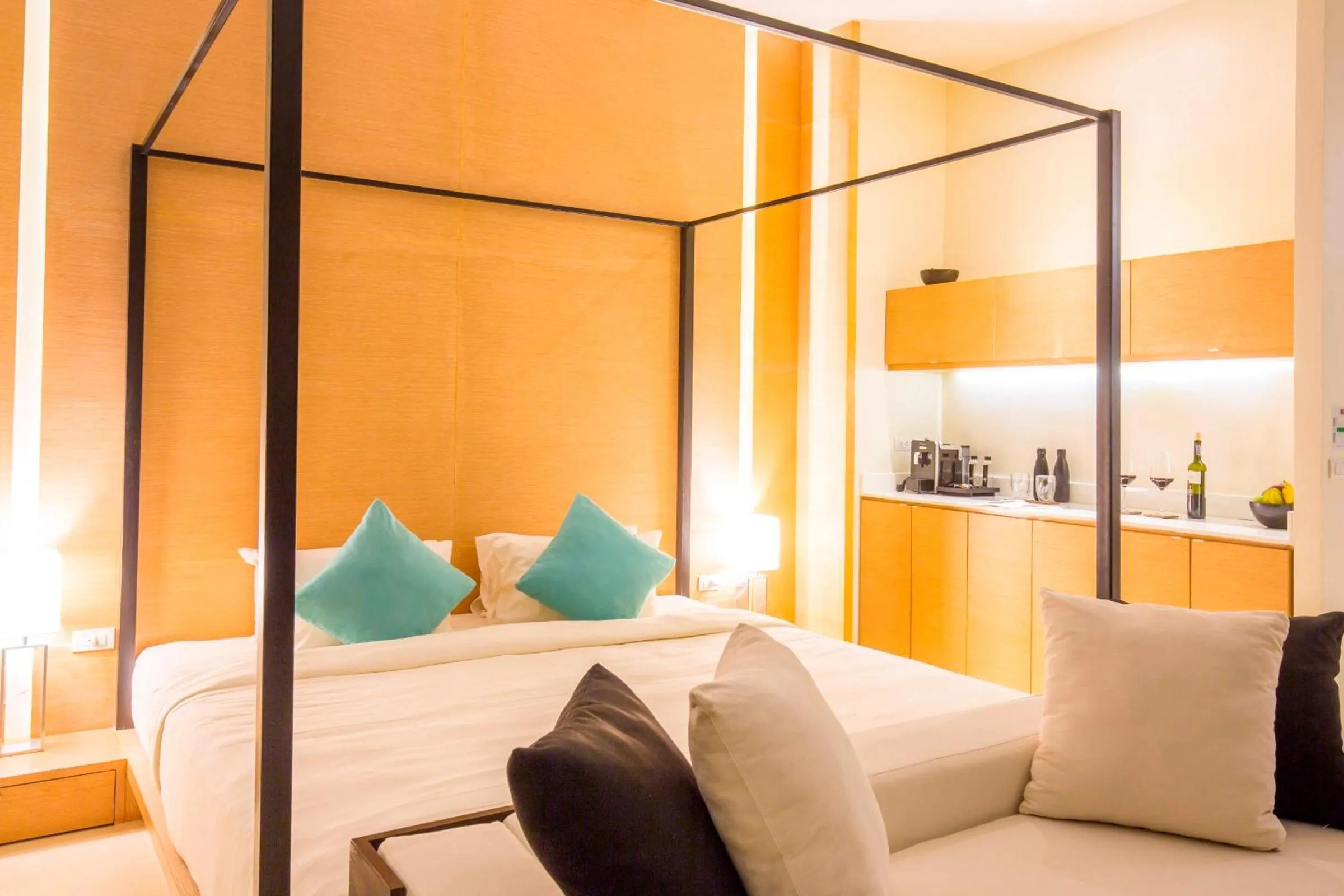 Bed in The Anda Mani Khaolak Beachfront Villas - Adult only