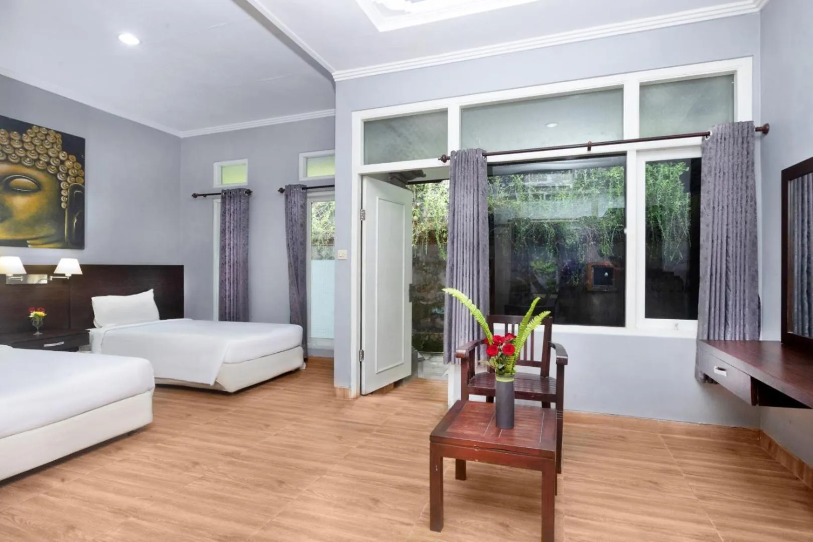 Bed in Dewi Sinta Hotel and Restaurant