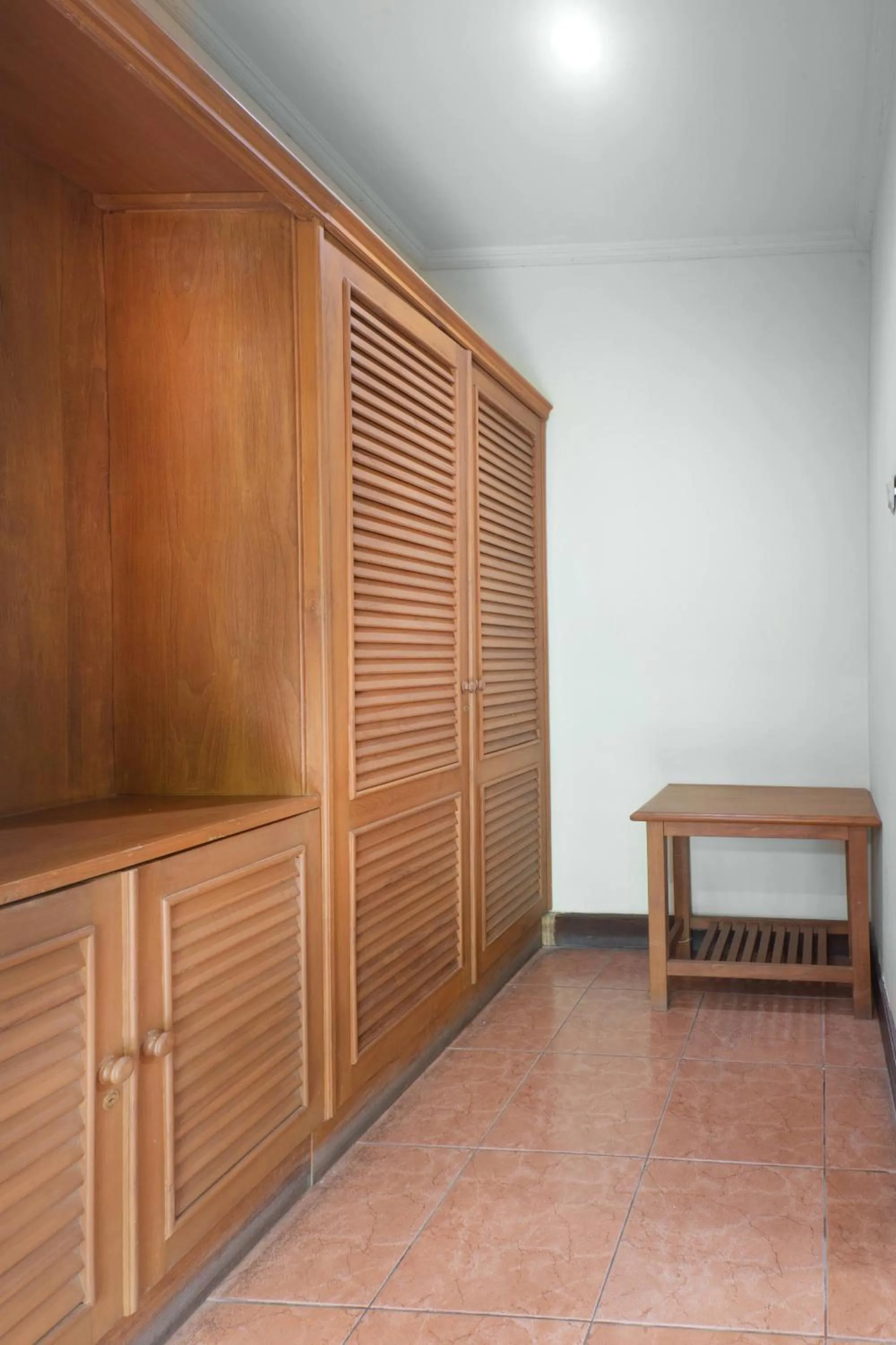 wardrobe in Dewi Sinta Hotel and Restaurant