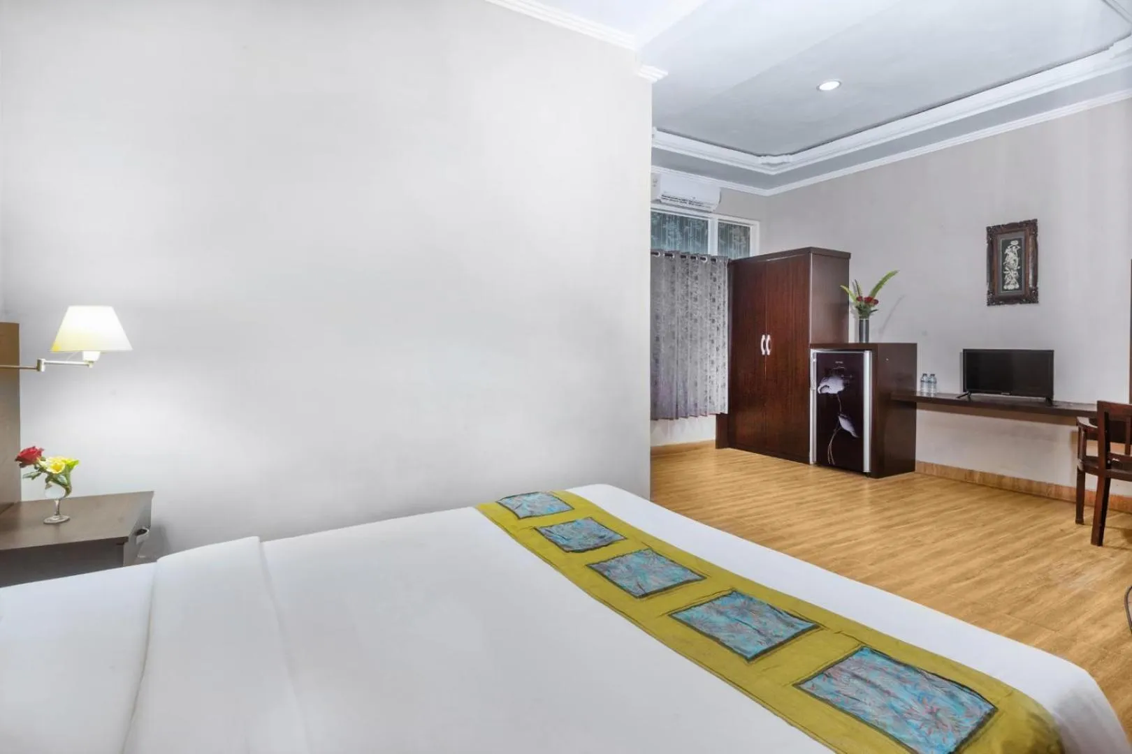 Bed in Dewi Sinta Hotel and Restaurant