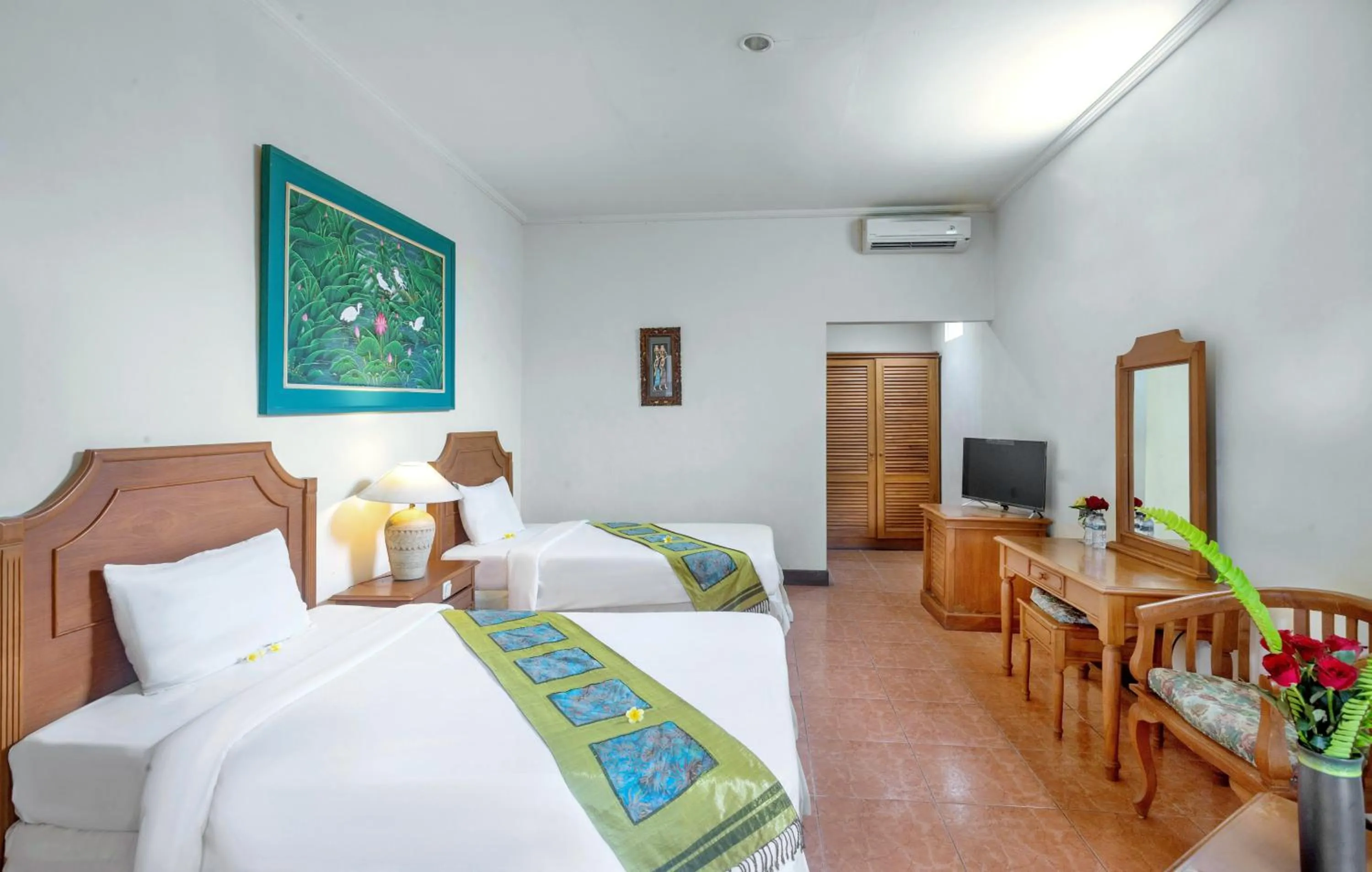 Bed in Dewi Sinta Hotel and Restaurant