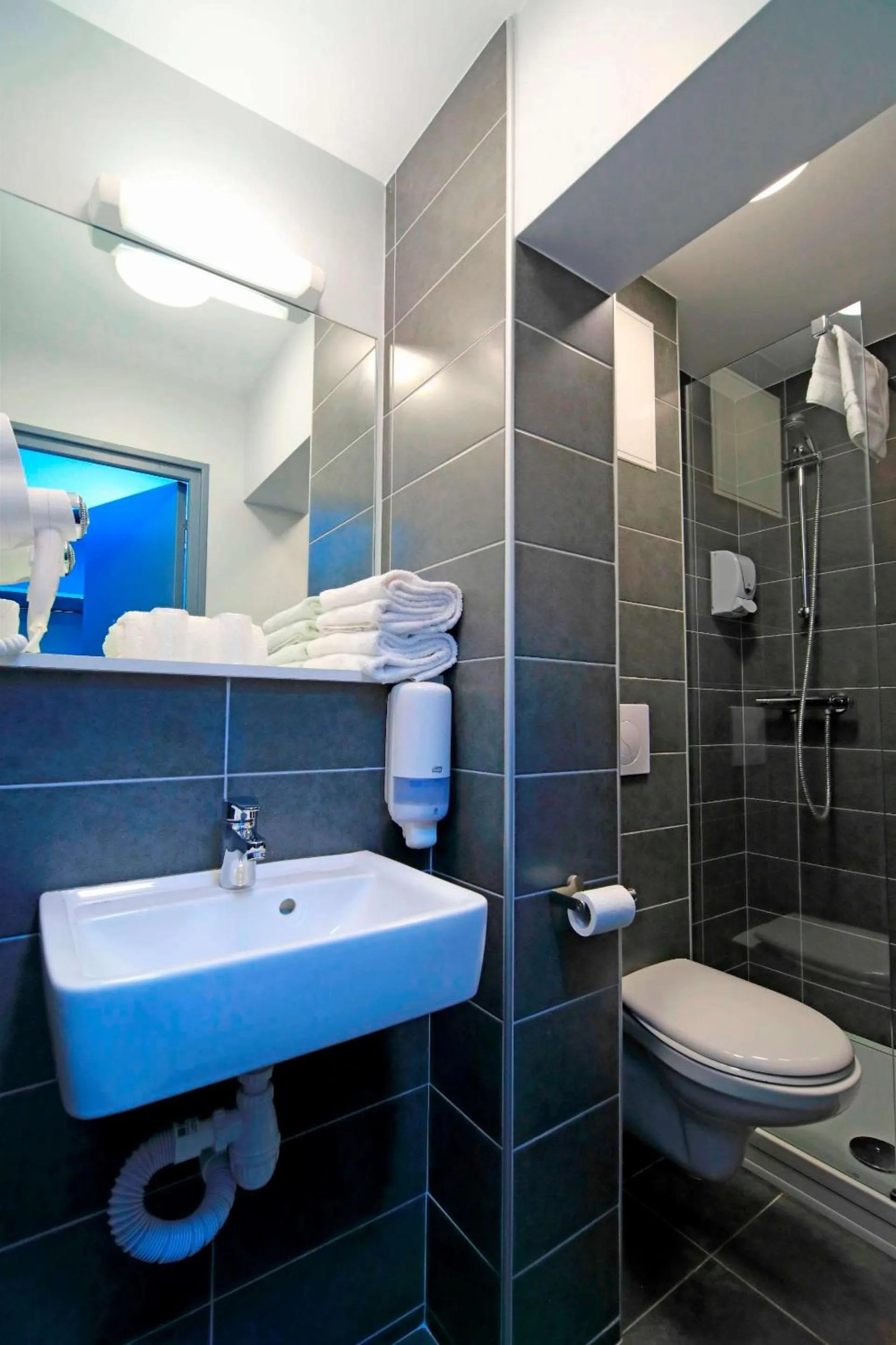 Bedroom in Brit Hotel Le Polder