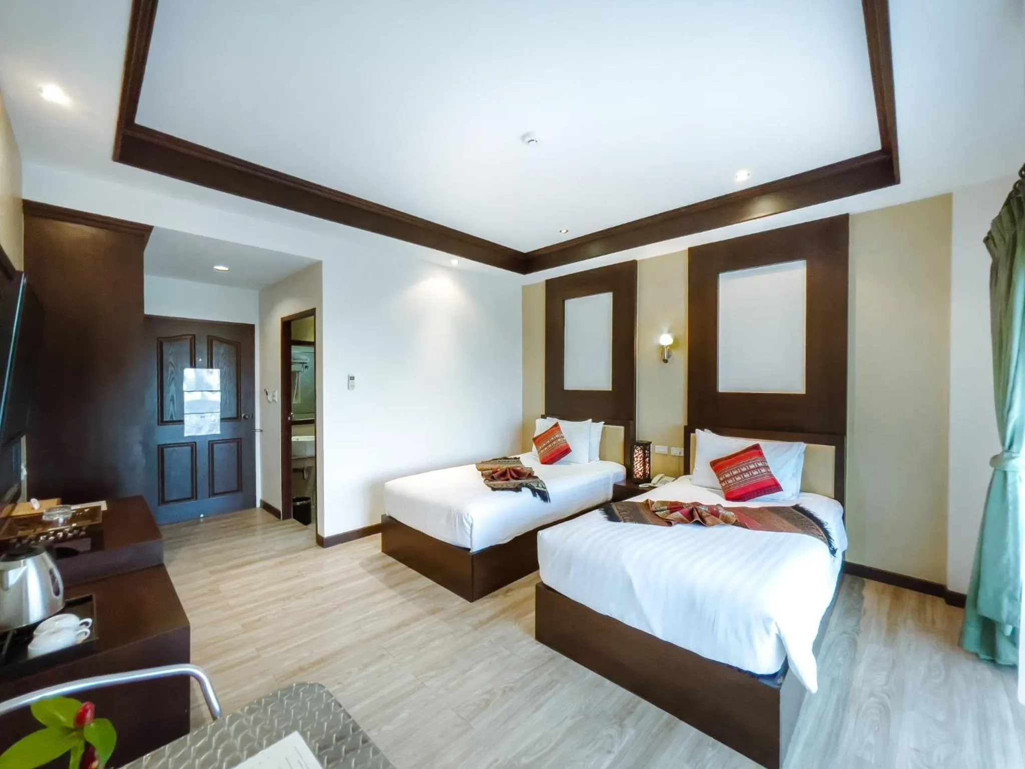 Bed in Royal Nakhara Hotel and Convention Centre