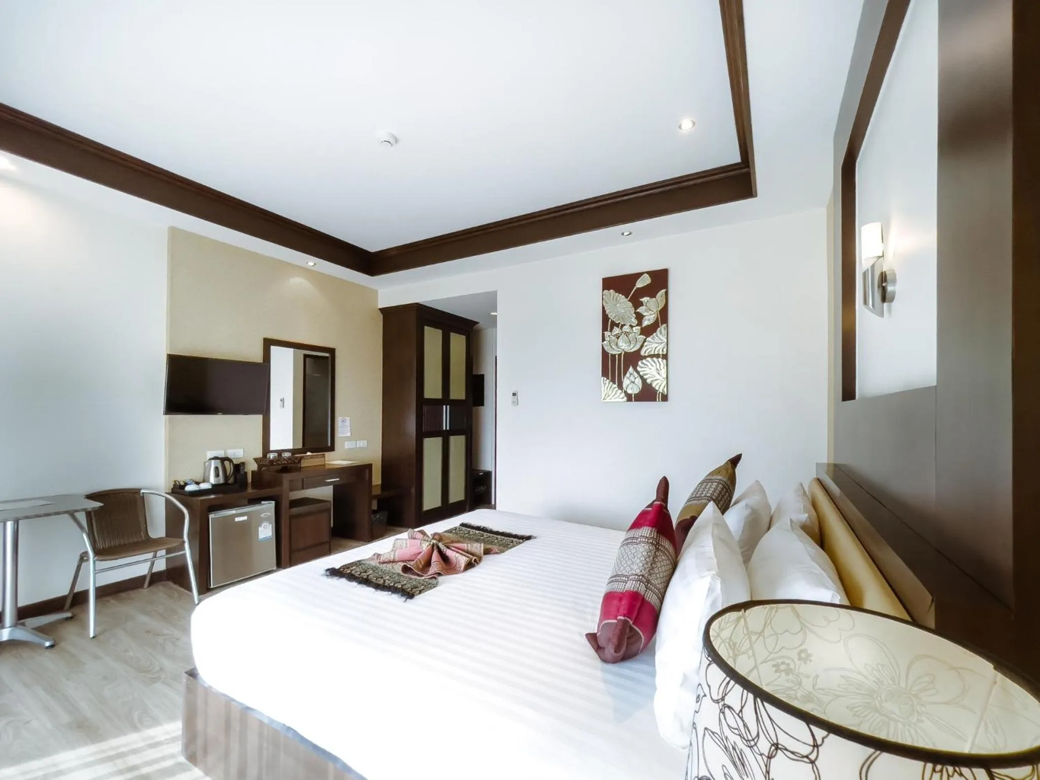 Photo of the whole room, Bed in Royal Nakhara Hotel and Convention Centre