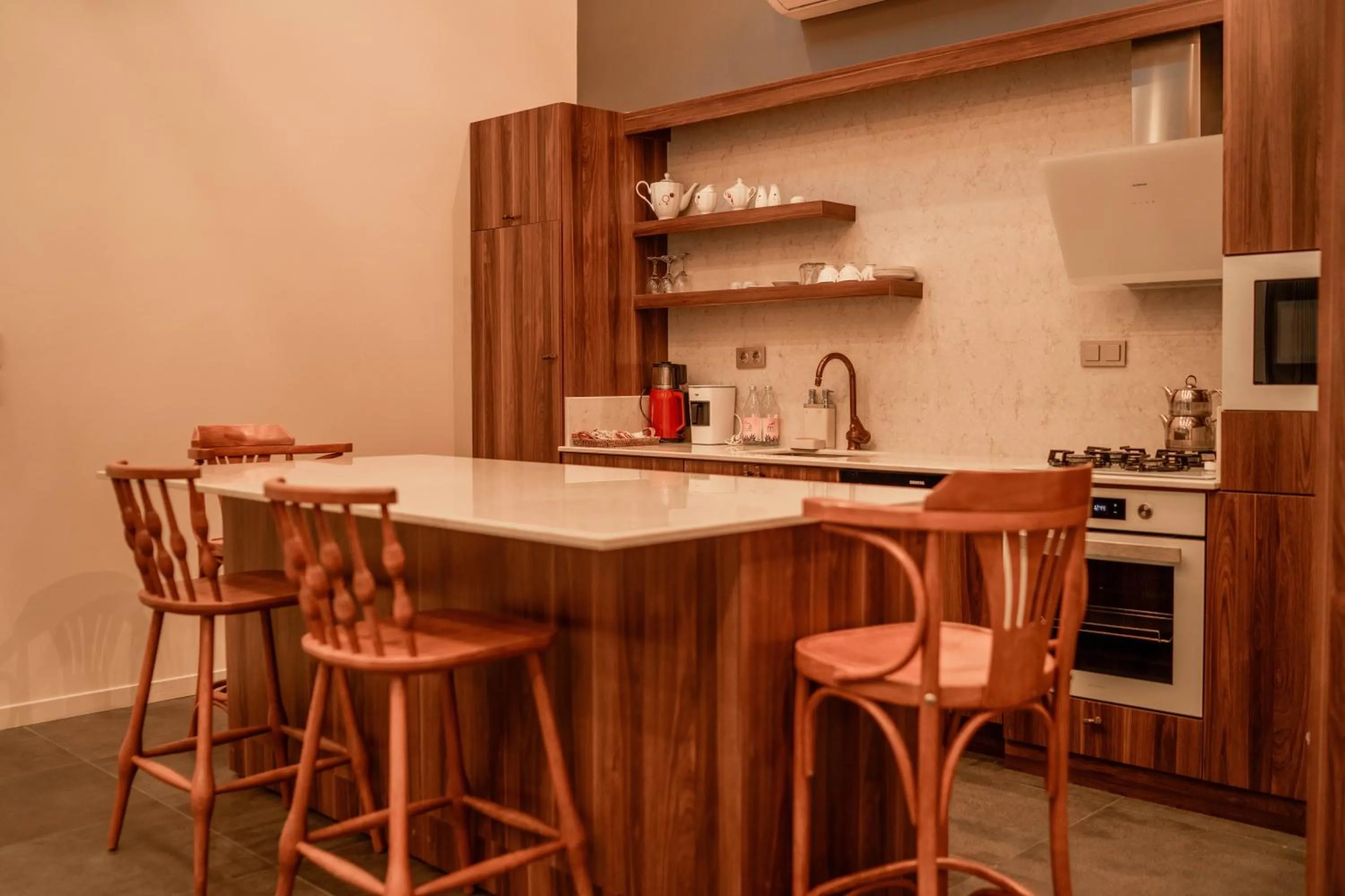 Kitchen or kitchenette in Alfa Suites & SPA