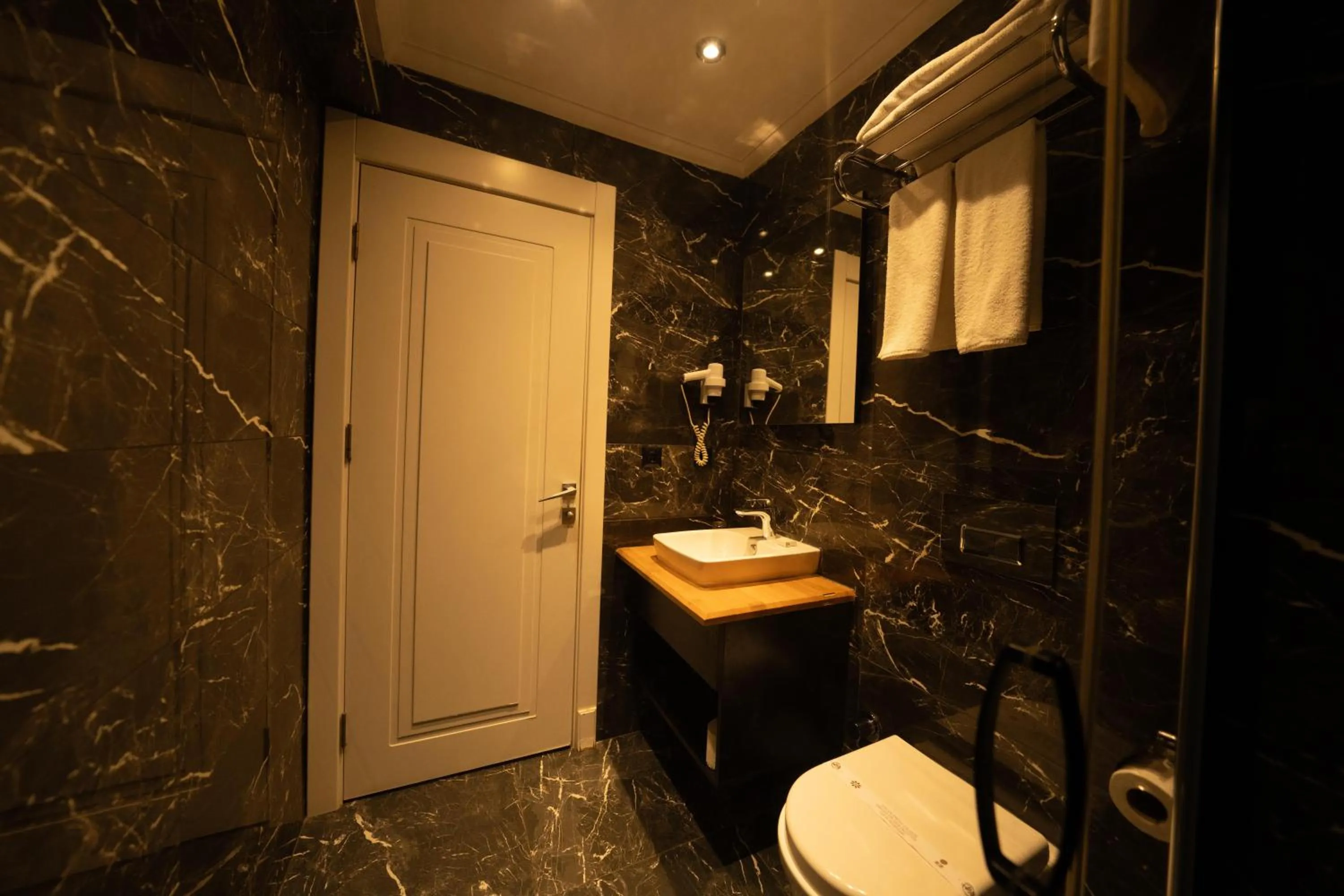 Bathroom in Alfa Suites & SPA