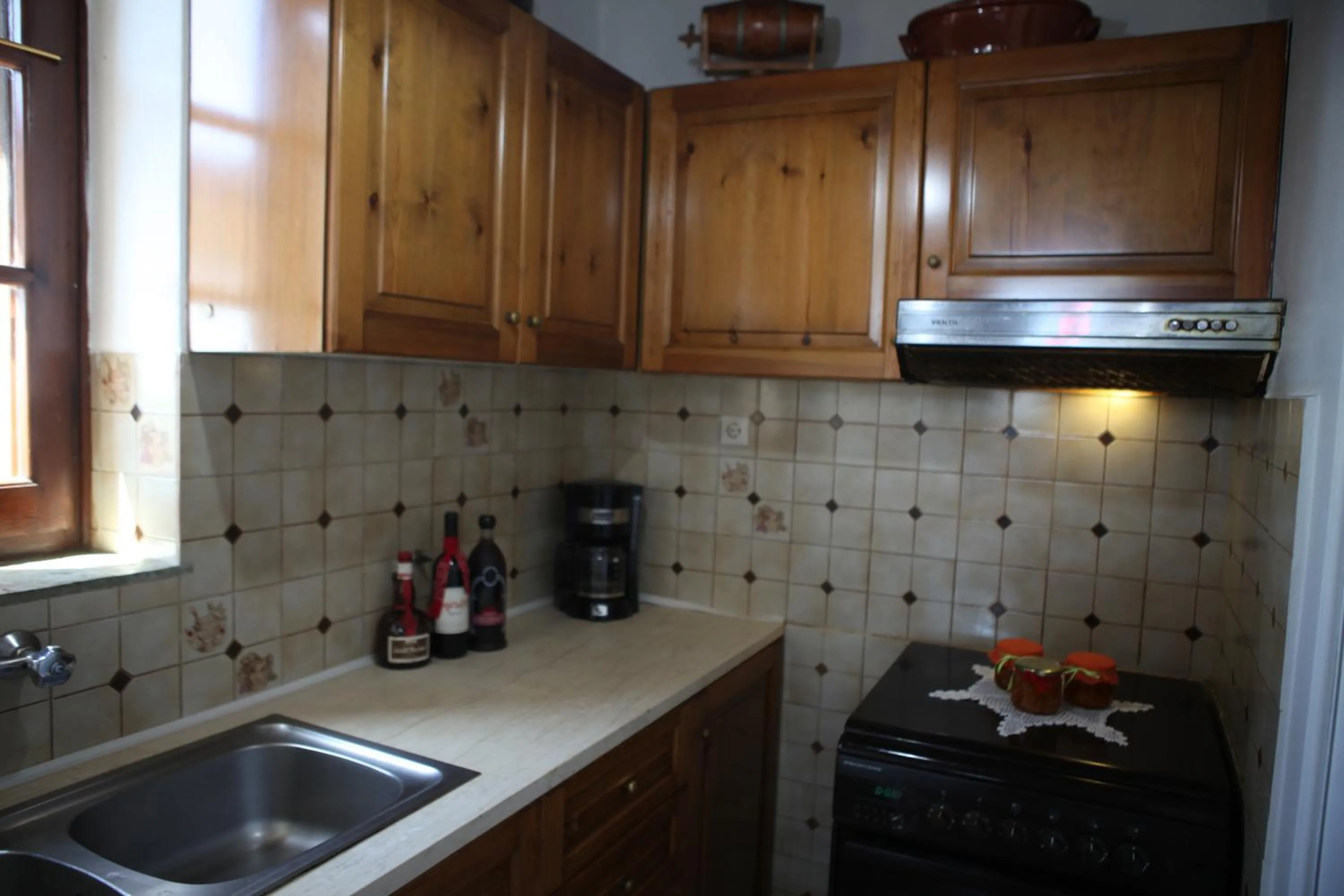 Kitchen or kitchenette in Archontiko Repana - Makrinitsa Stone Retreat