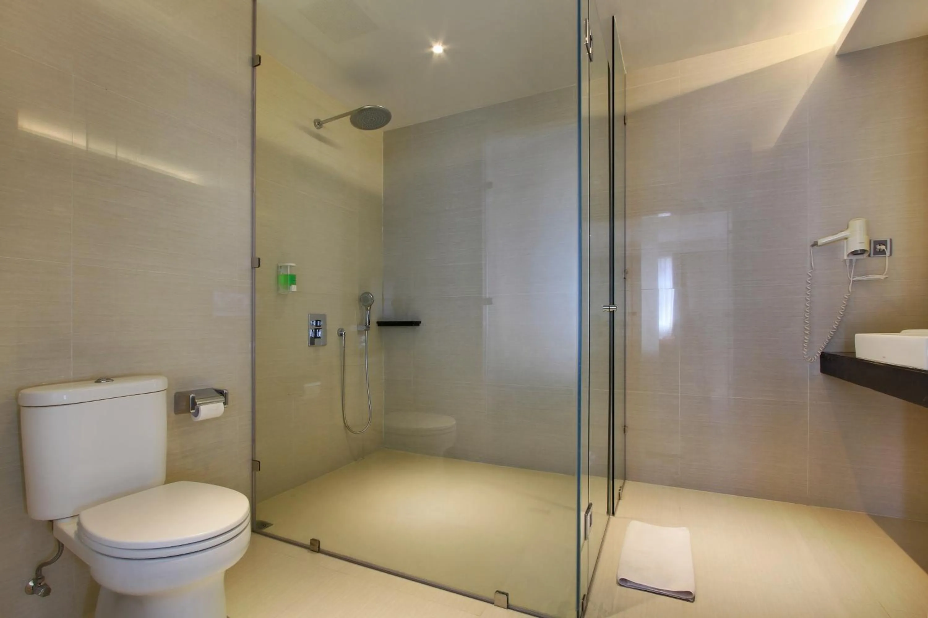 Bathroom in Ohana Hotel Kuta