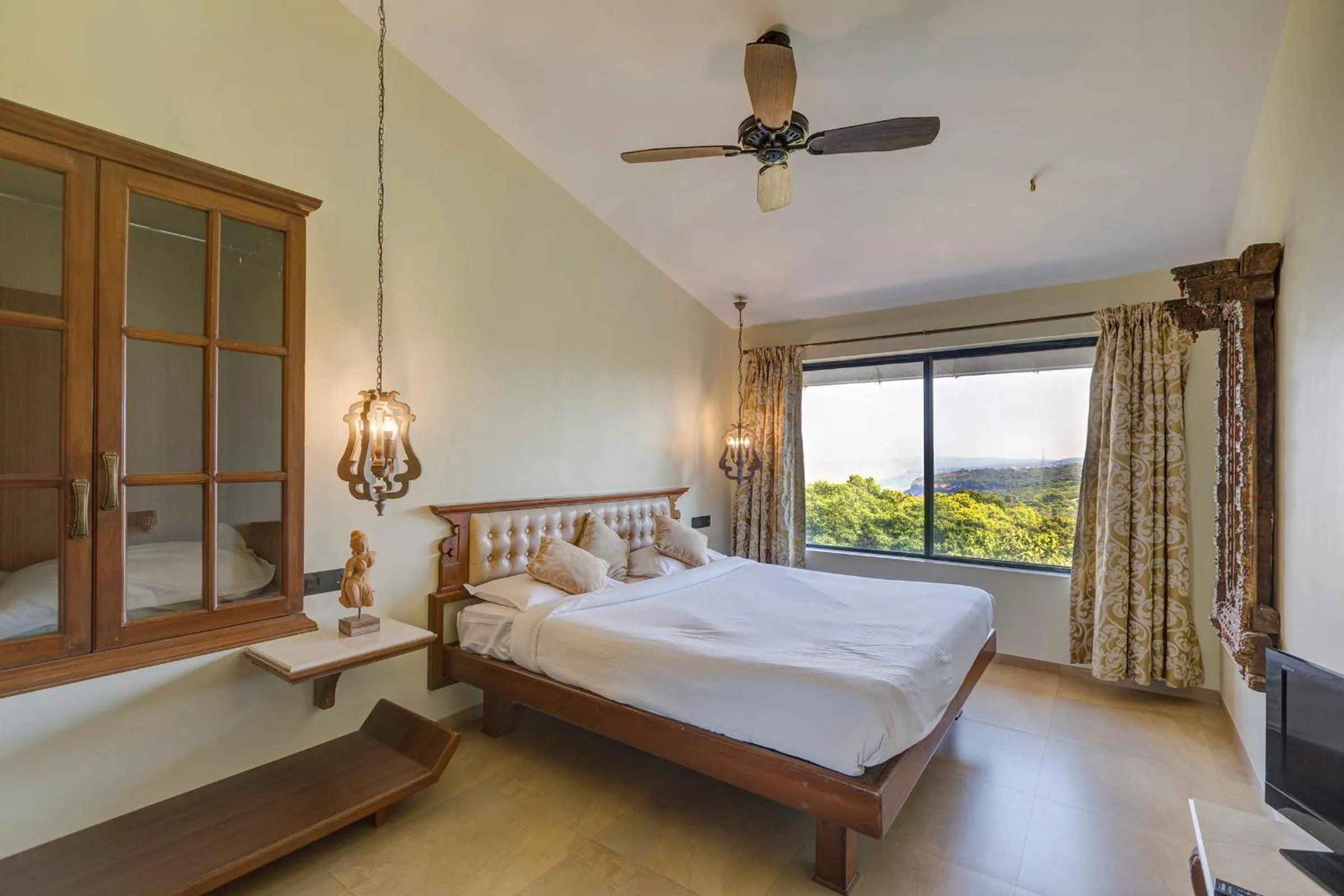 Bed in Ramsukh Resorts and Spa