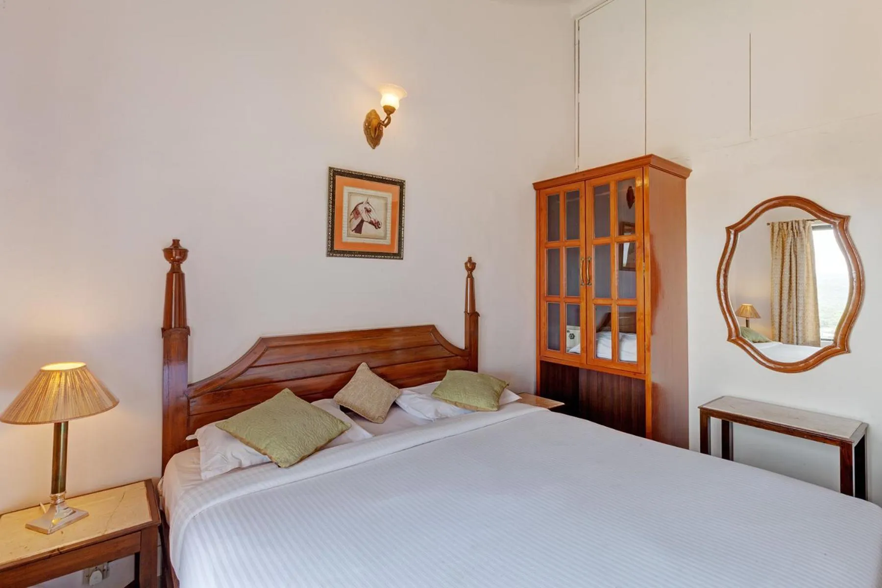 Bed in Ramsukh Resorts and Spa