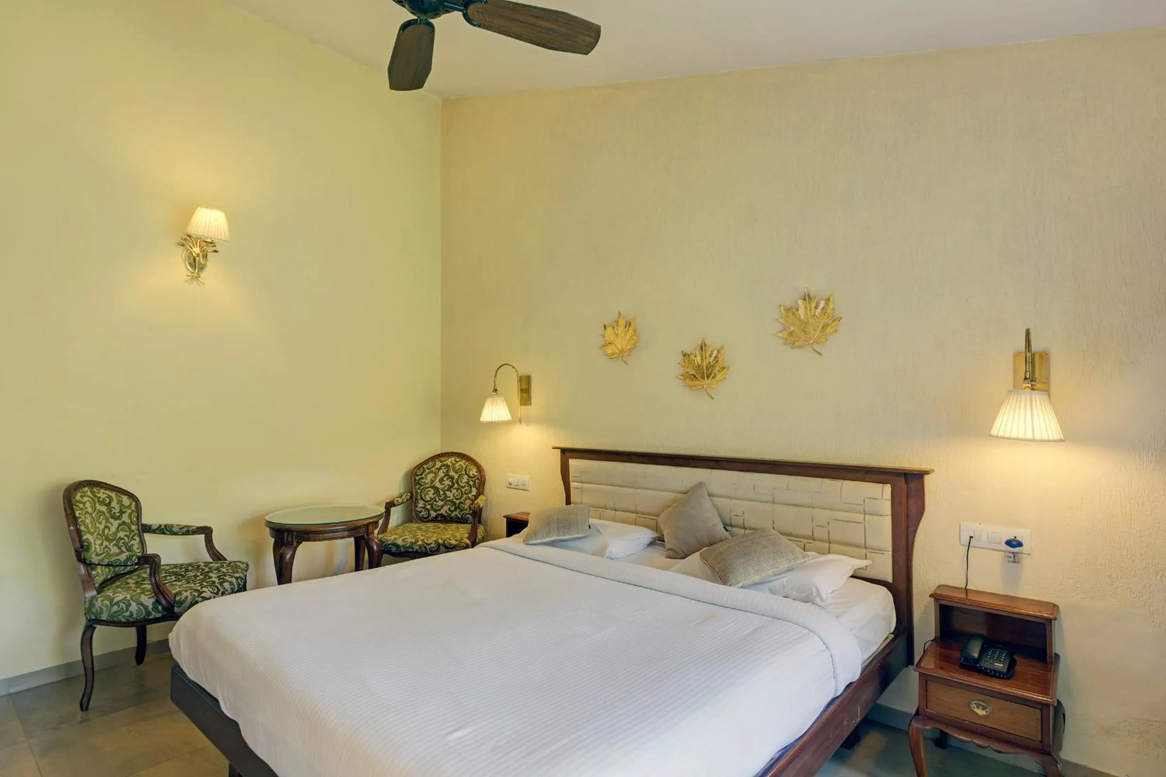 Bed in Ramsukh Resorts and Spa