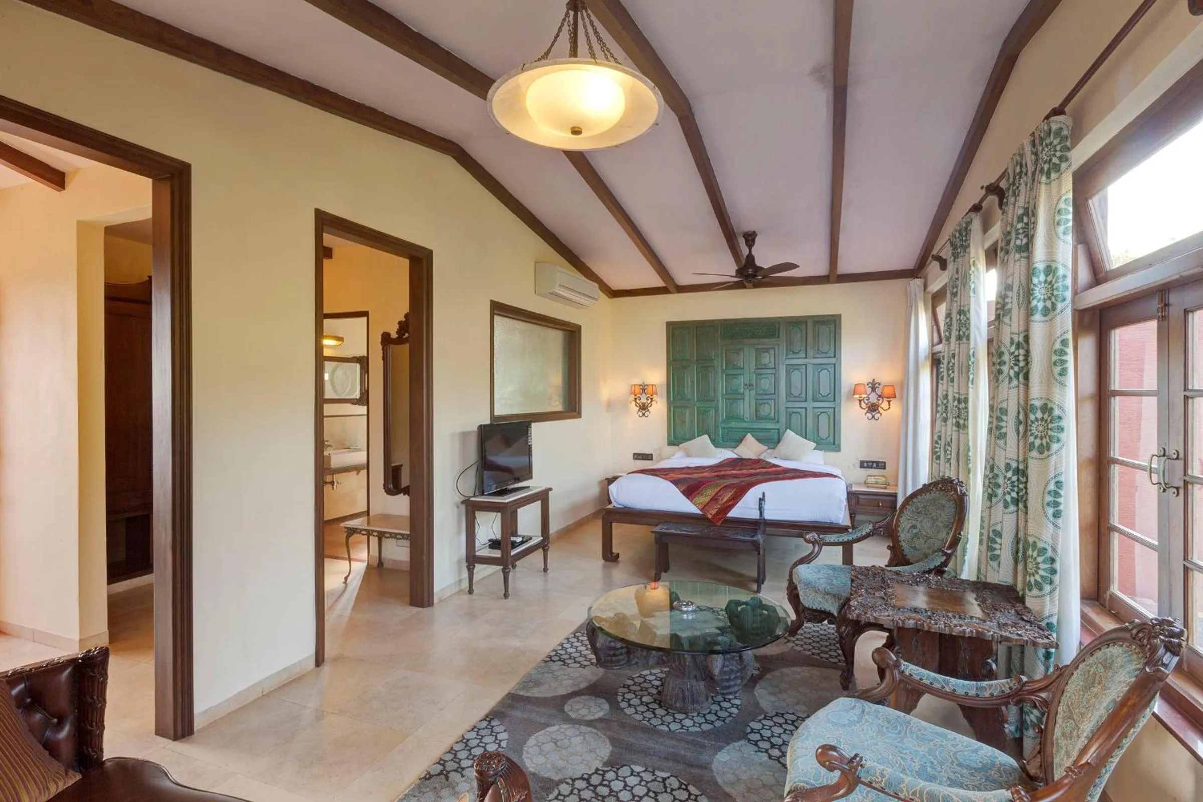 Bed in Ramsukh Resorts and Spa