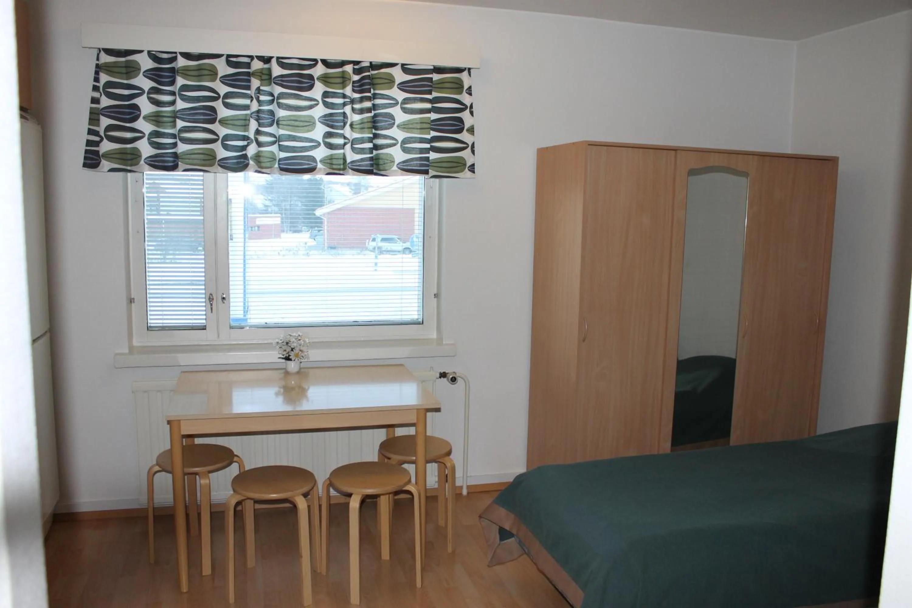 Kitchen or kitchenette, Bed in Motelli Jätkänkolo