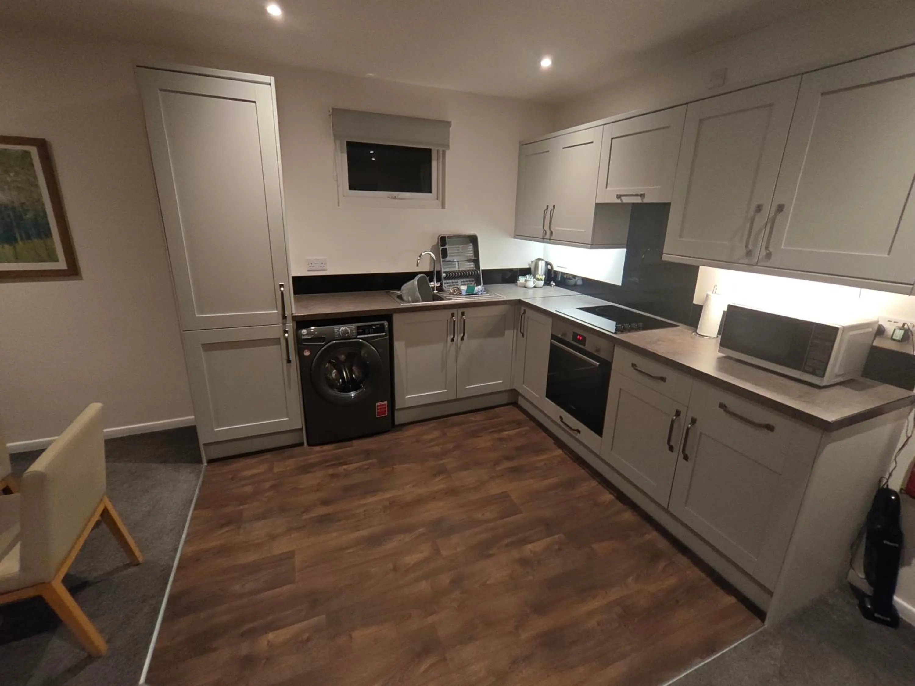 Kitchen or kitchenette in Trenython Manor Resort