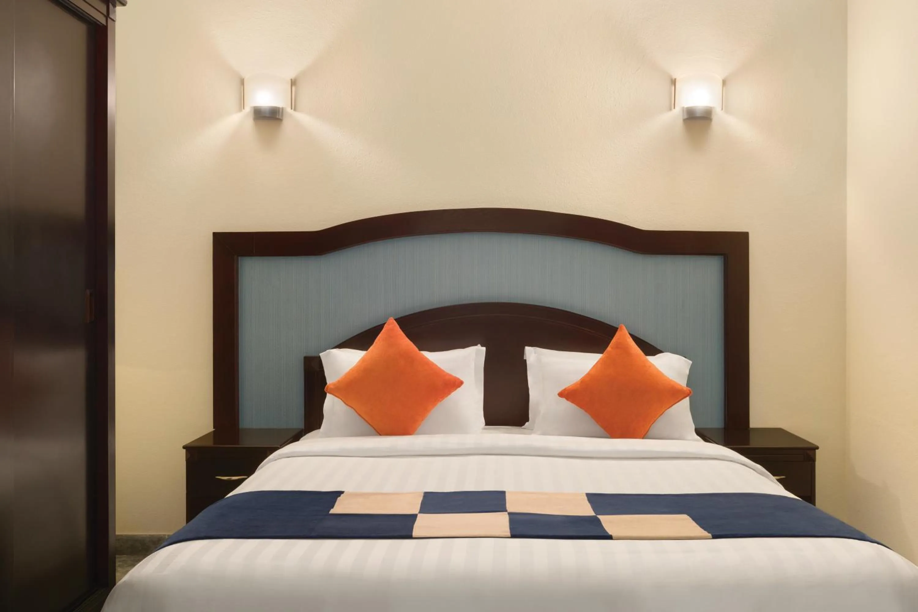 Bed in Howard Johnson Dammam Hotel