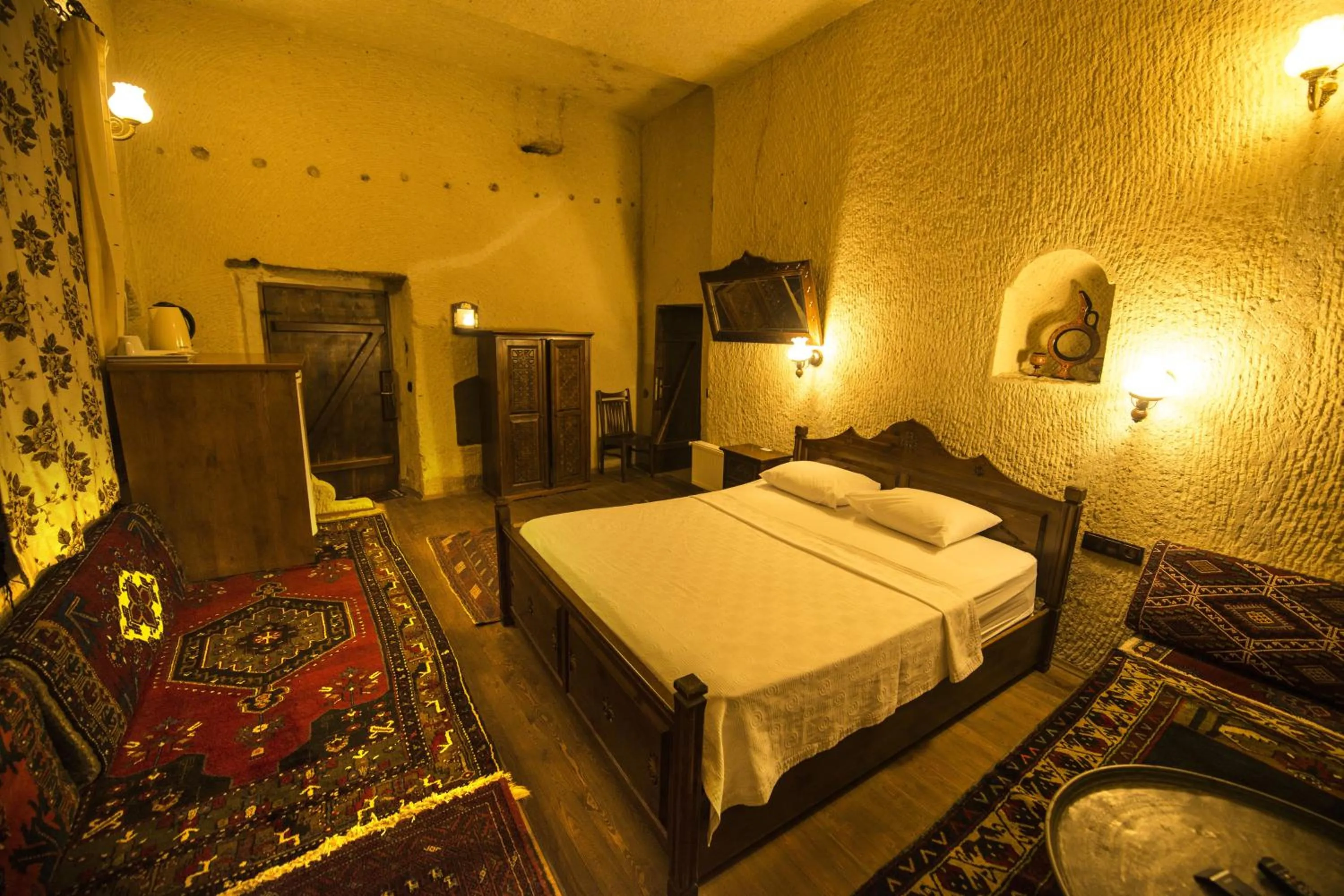 Bed in Vineyard Cave Hotel