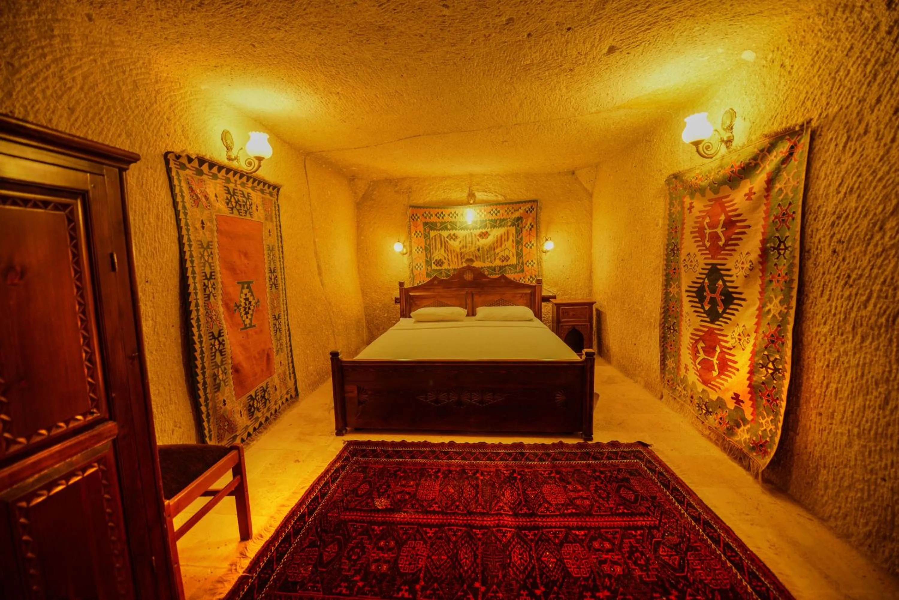 Bed in Vineyard Cave Hotel