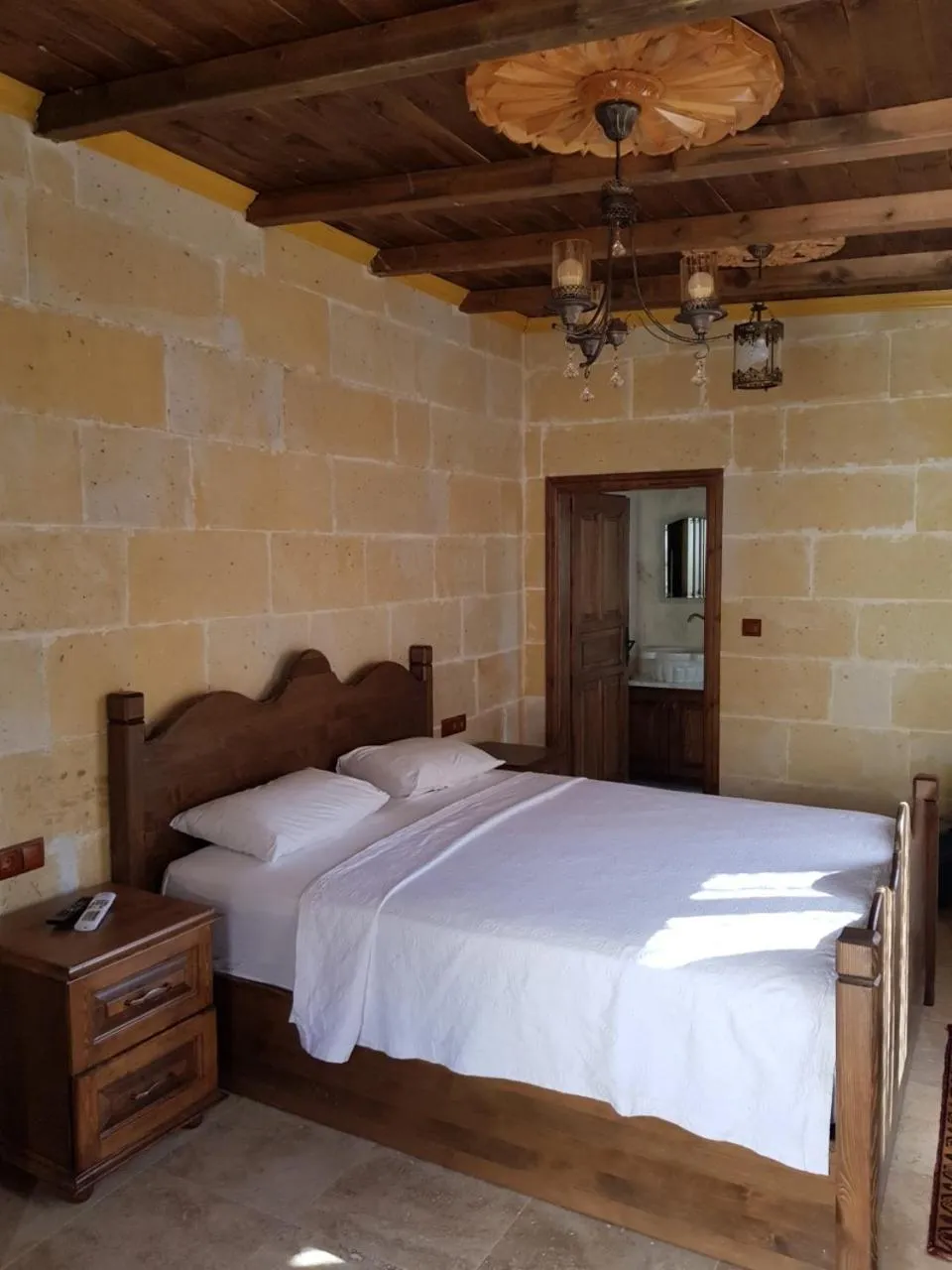 Bed in Vineyard Cave Hotel