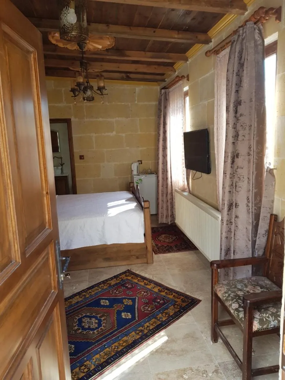 Bed in Vineyard Cave Hotel