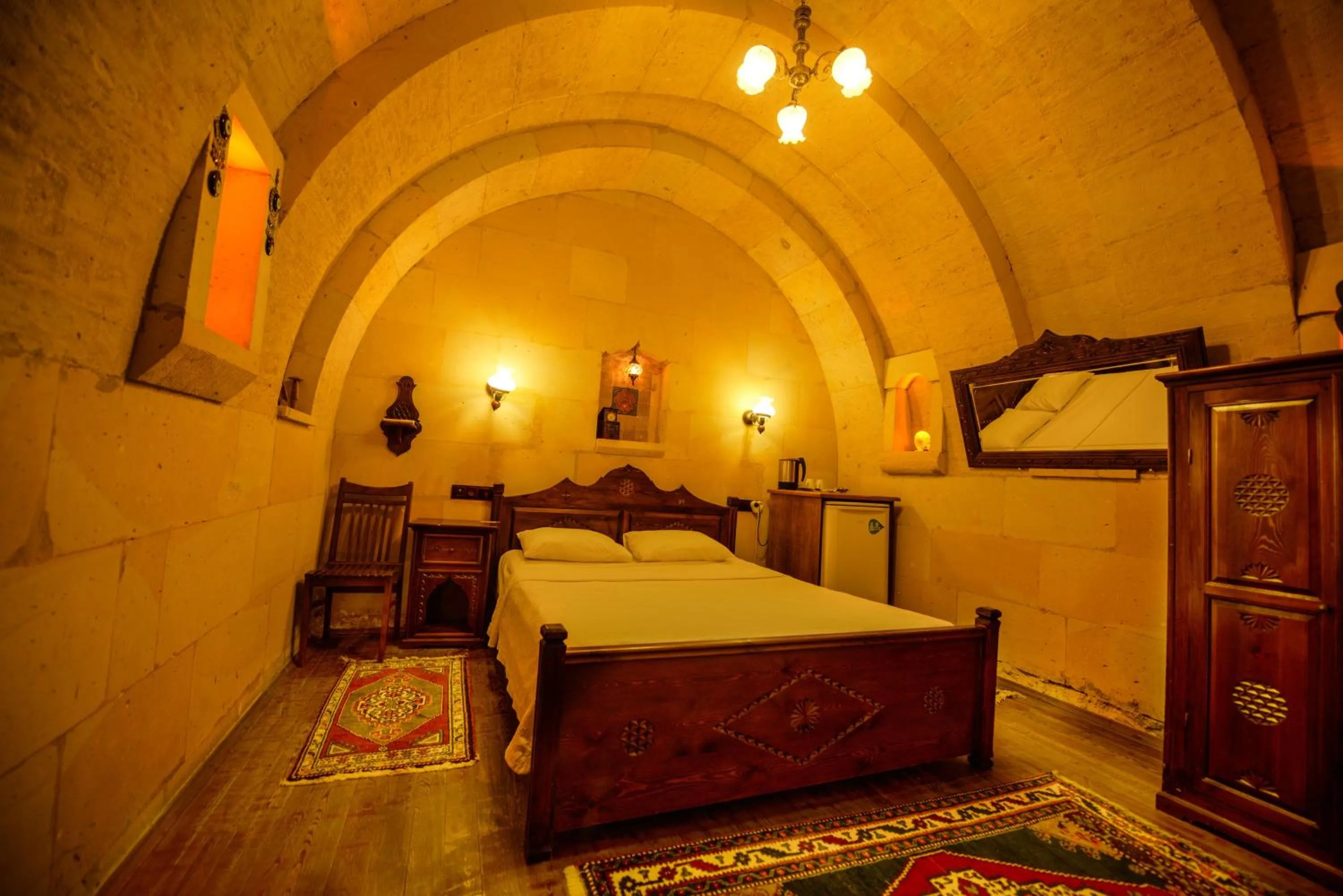 Bed in Vineyard Cave Hotel