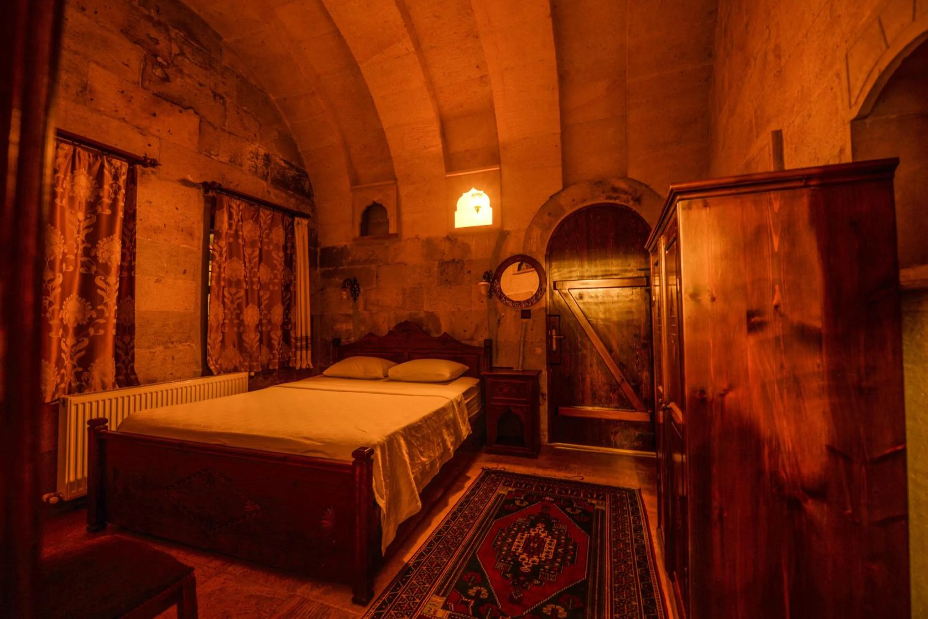 Bed in Vineyard Cave Hotel