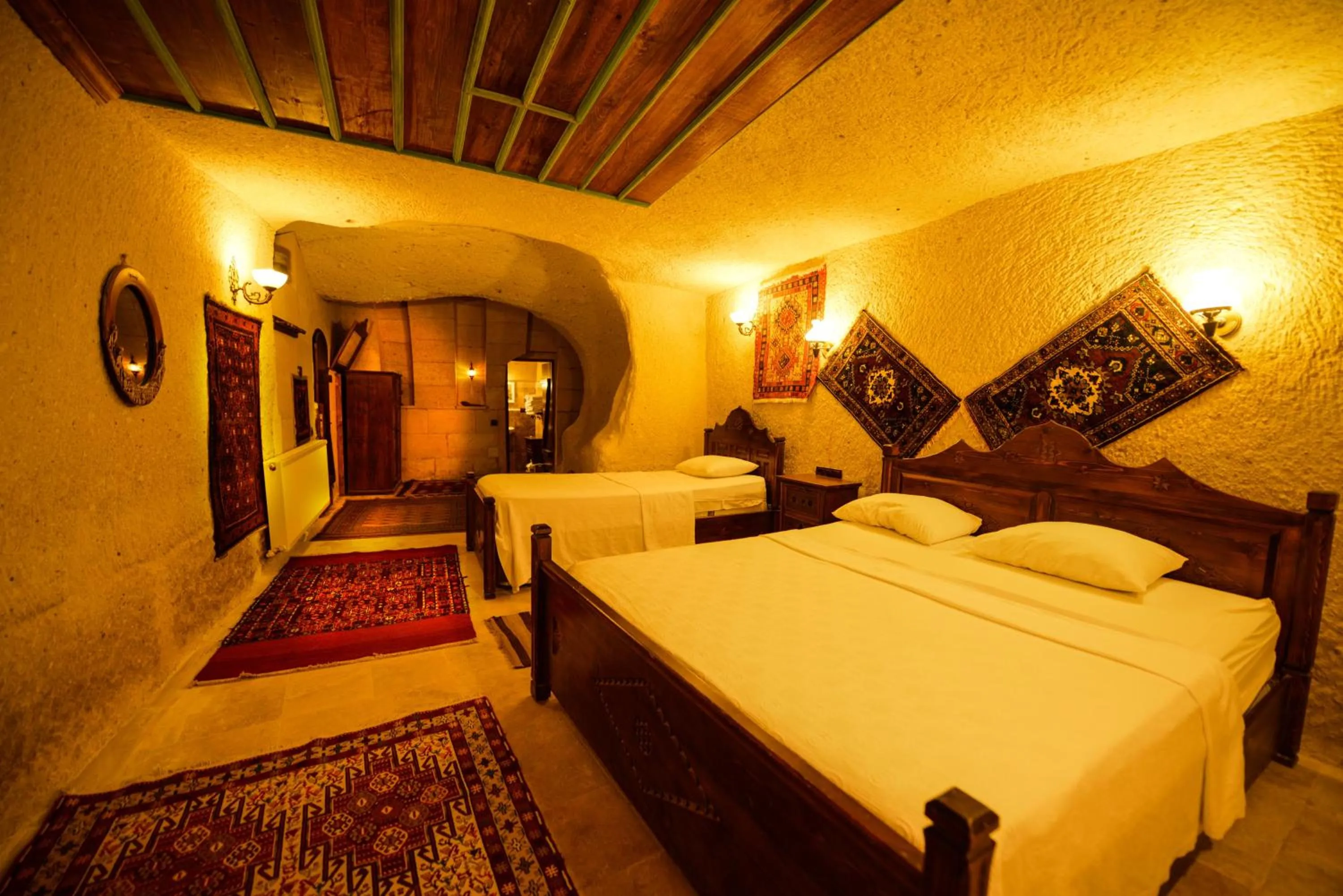 Bed in Vineyard Cave Hotel