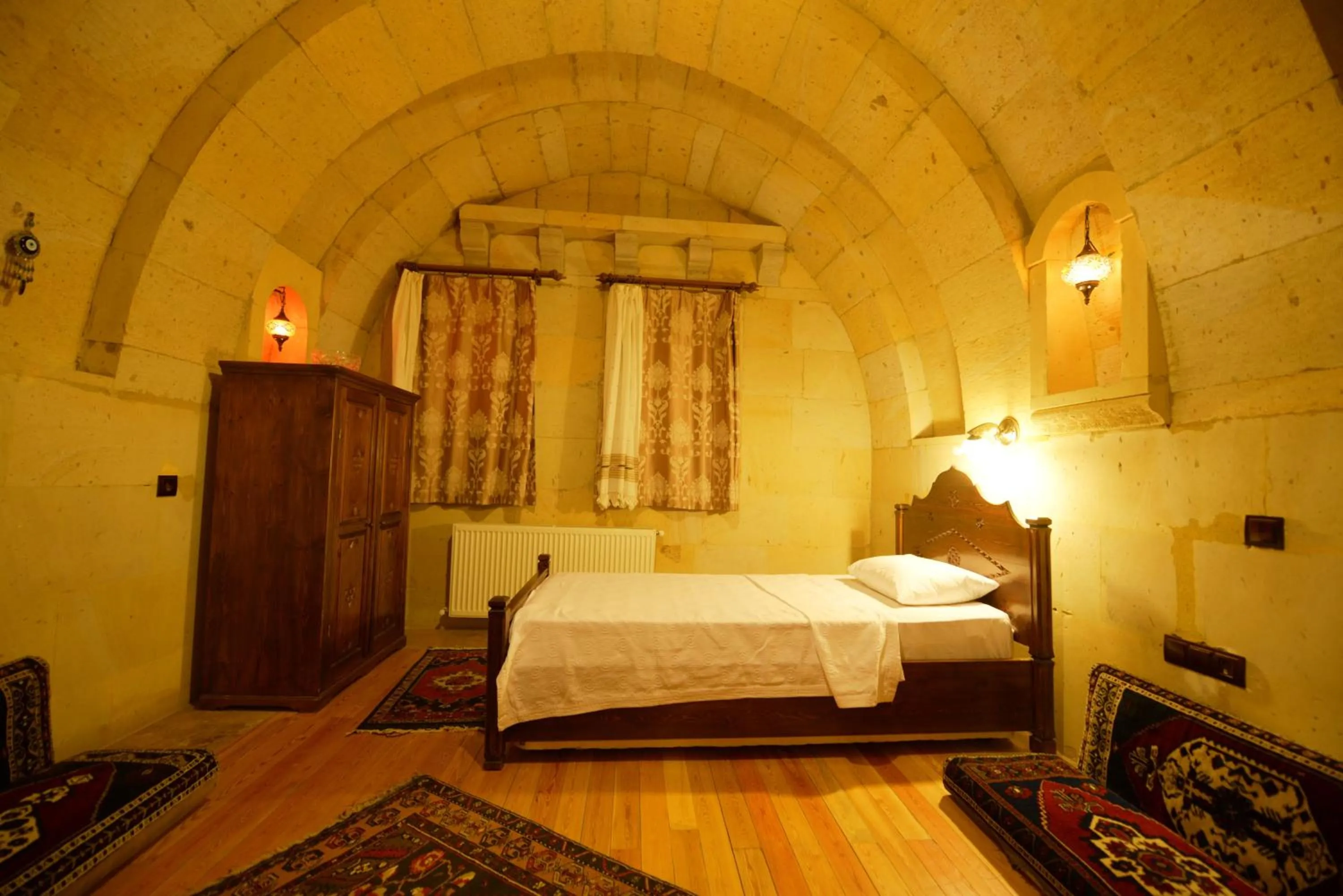 Bed in Vineyard Cave Hotel
