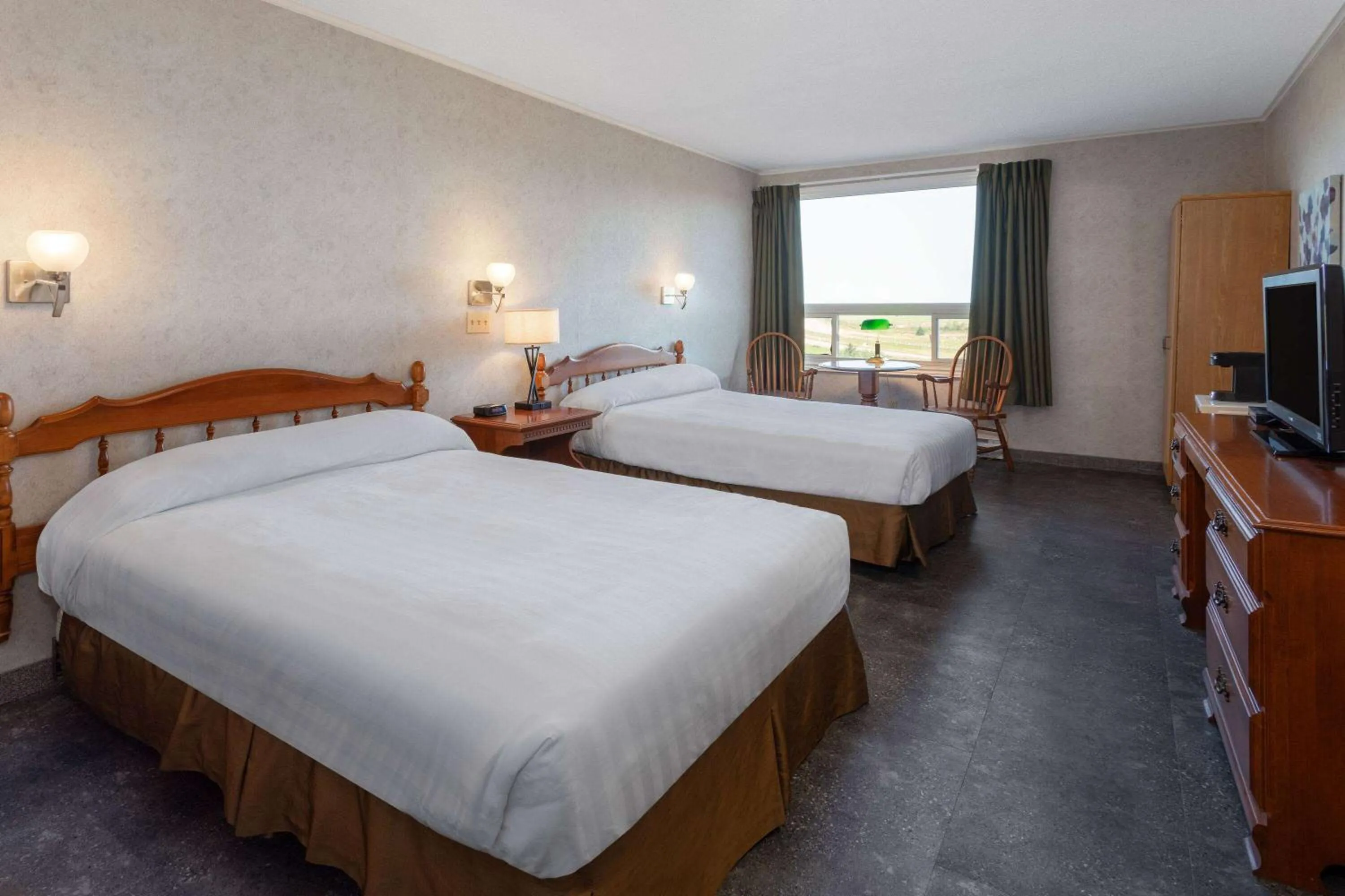 Photo of the whole room, Bed in Travelodge by Wyndham Amherst