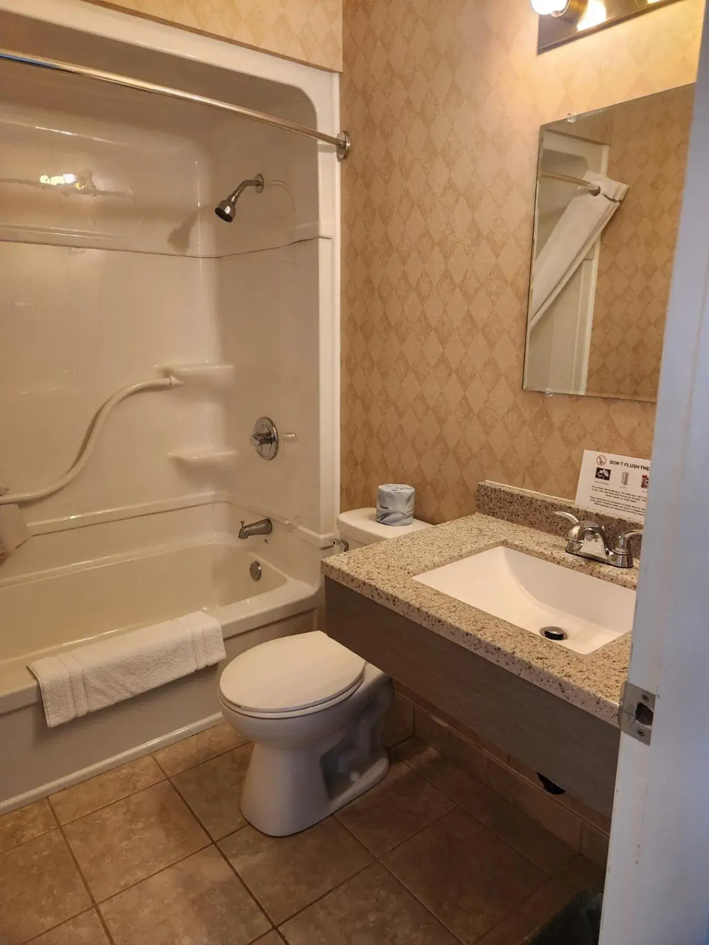 Bathroom in Travelodge by Wyndham Amherst Bathroom in Travelodge by Wyndham Amherst