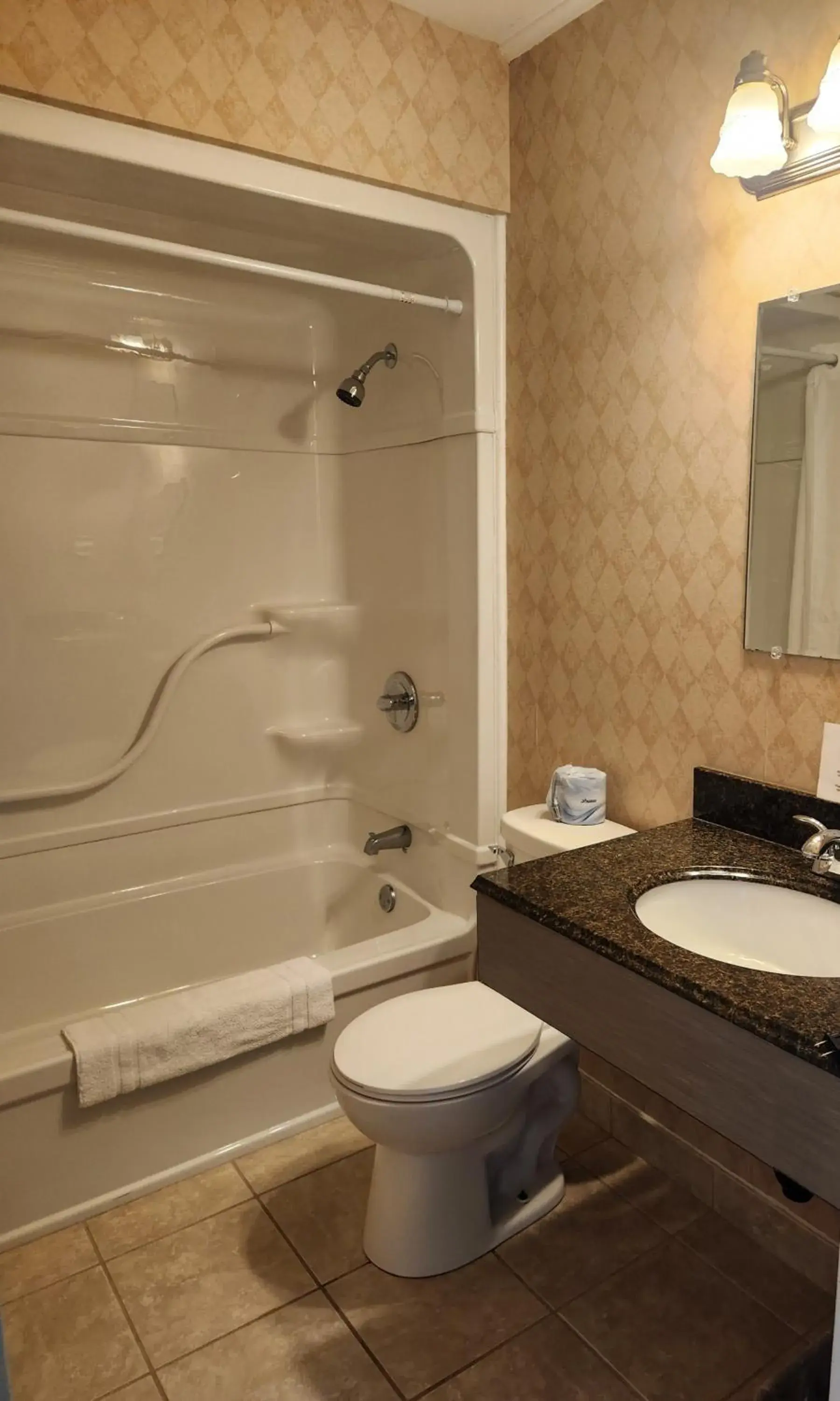 Bathroom in Travelodge by Wyndham Amherst Bathroom in Travelodge by Wyndham Amherst