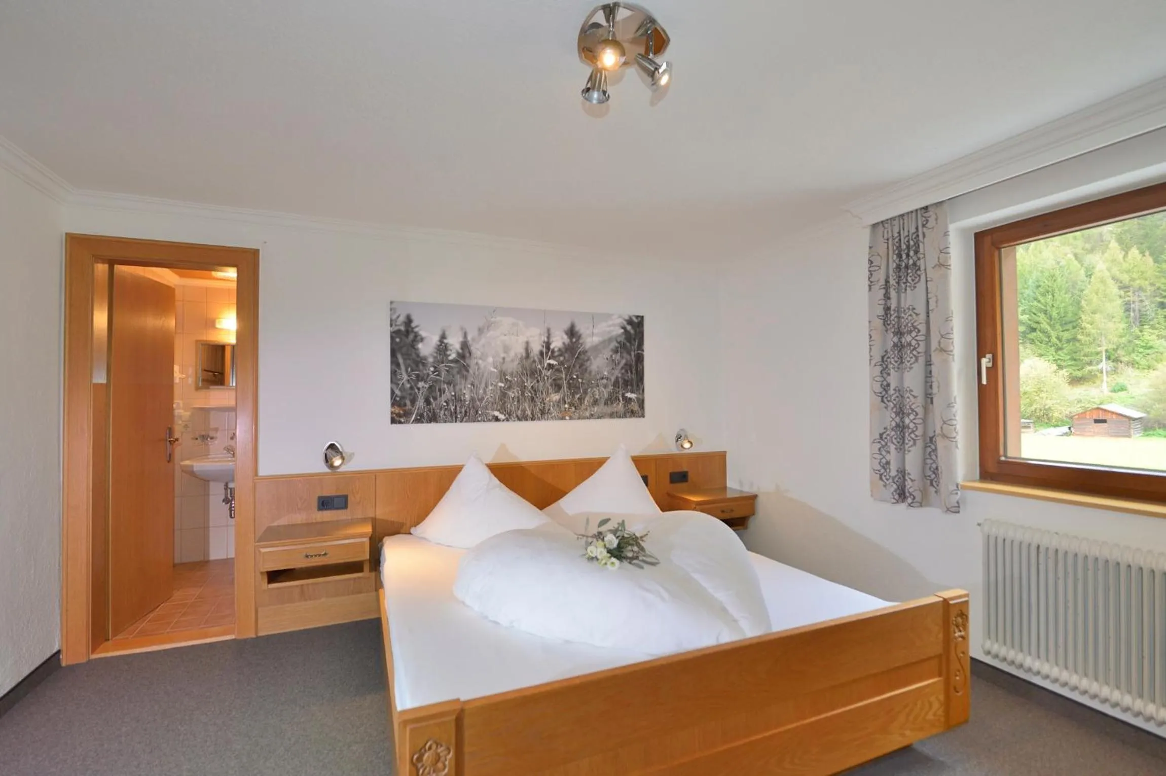 Bed in Hotel Garni Bergwelt