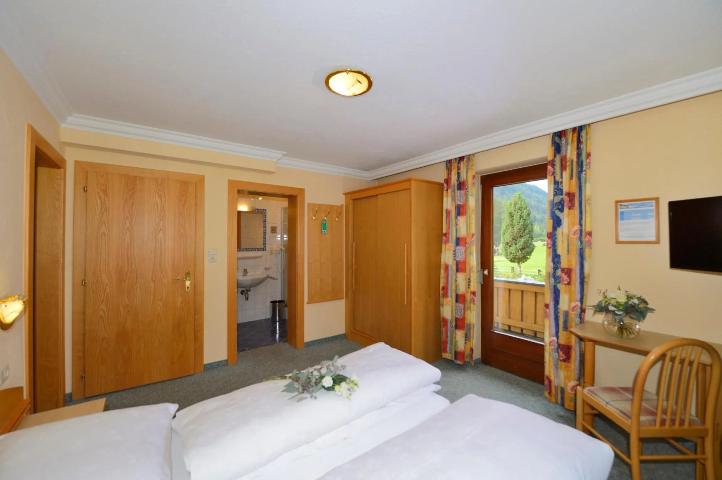 Bed in Hotel Garni Bergwelt