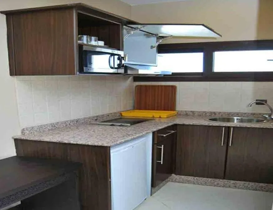 Kitchen or kitchenette in Suite Hotel Tilila