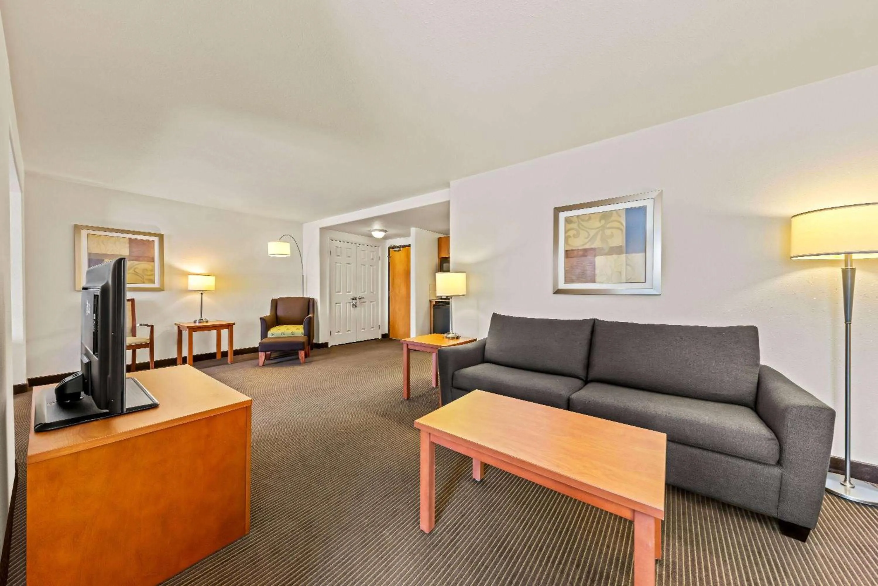 Living room in Wingate by Wyndham Calgary South