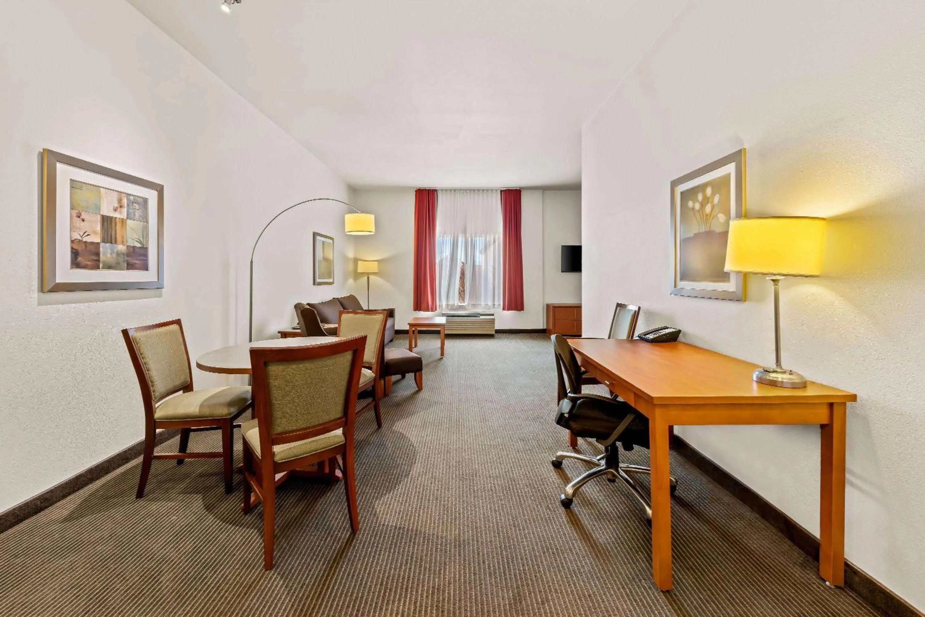 Living room in Wingate by Wyndham Calgary South