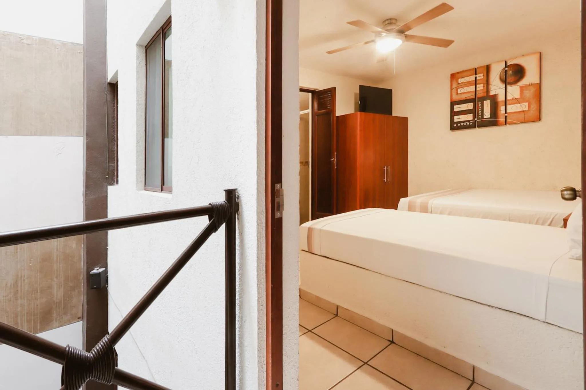 Bed in Hotel Guivá Huatulco