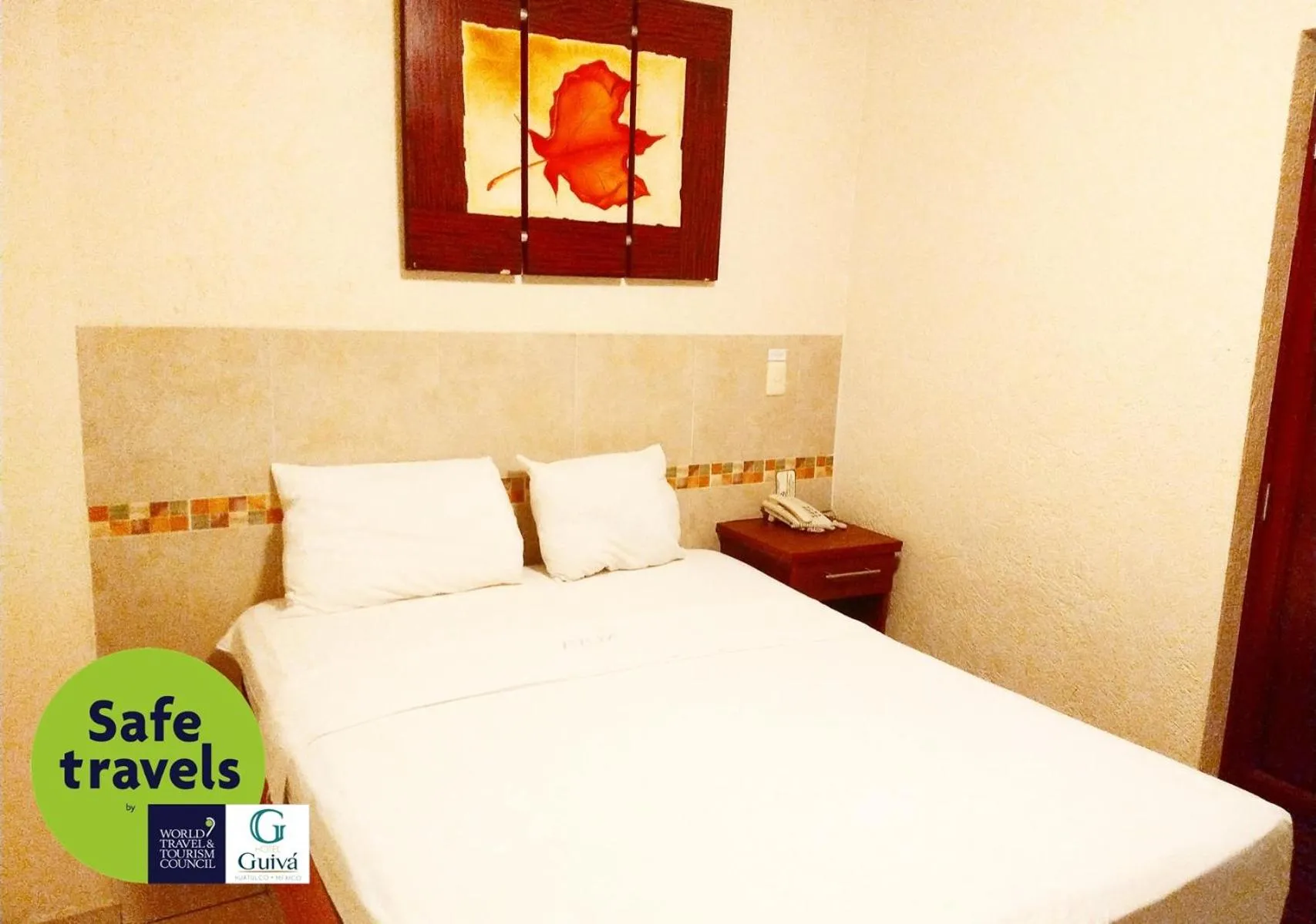 Bed in Hotel Guivá Huatulco