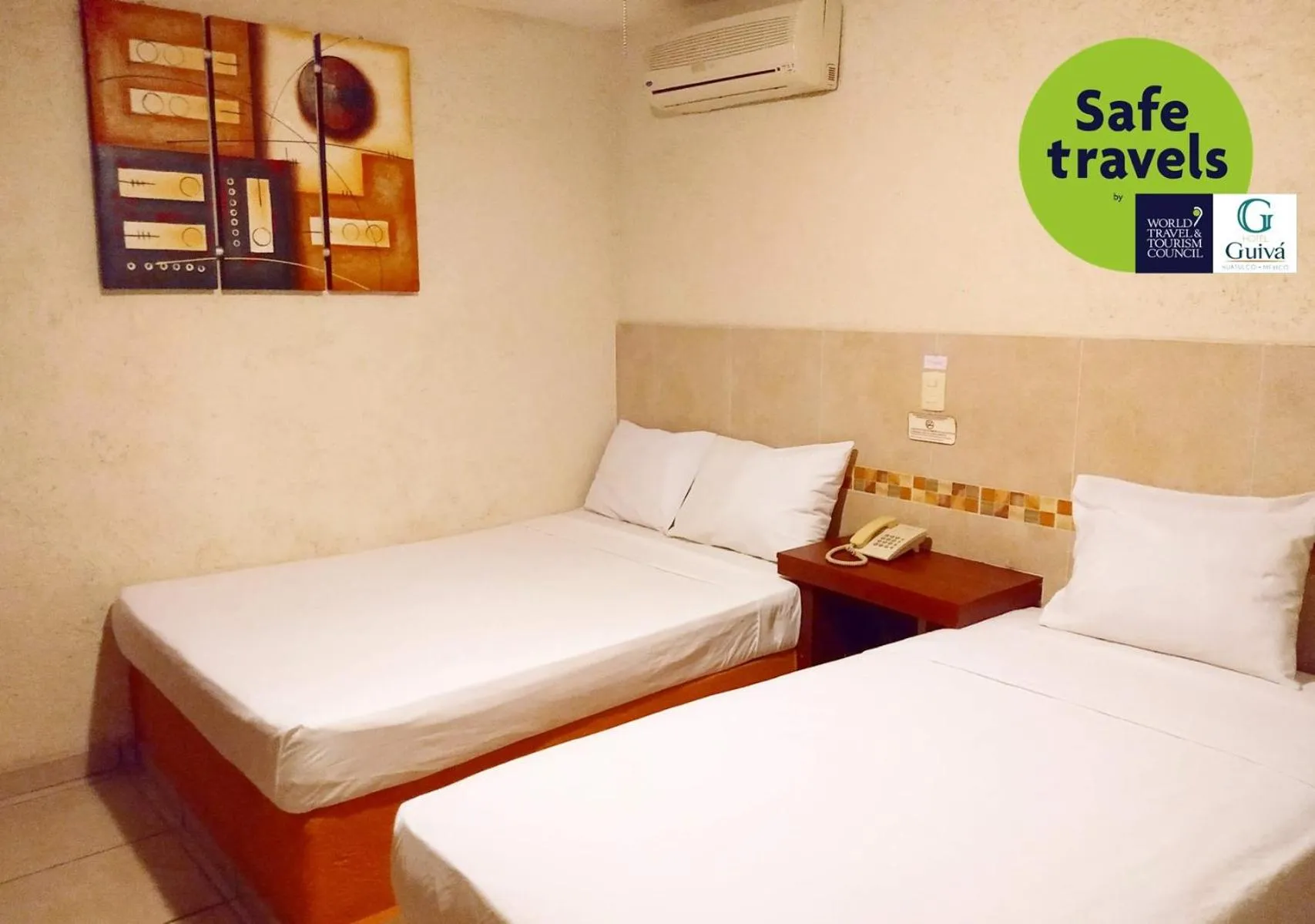 Bed in Hotel Guivá Huatulco