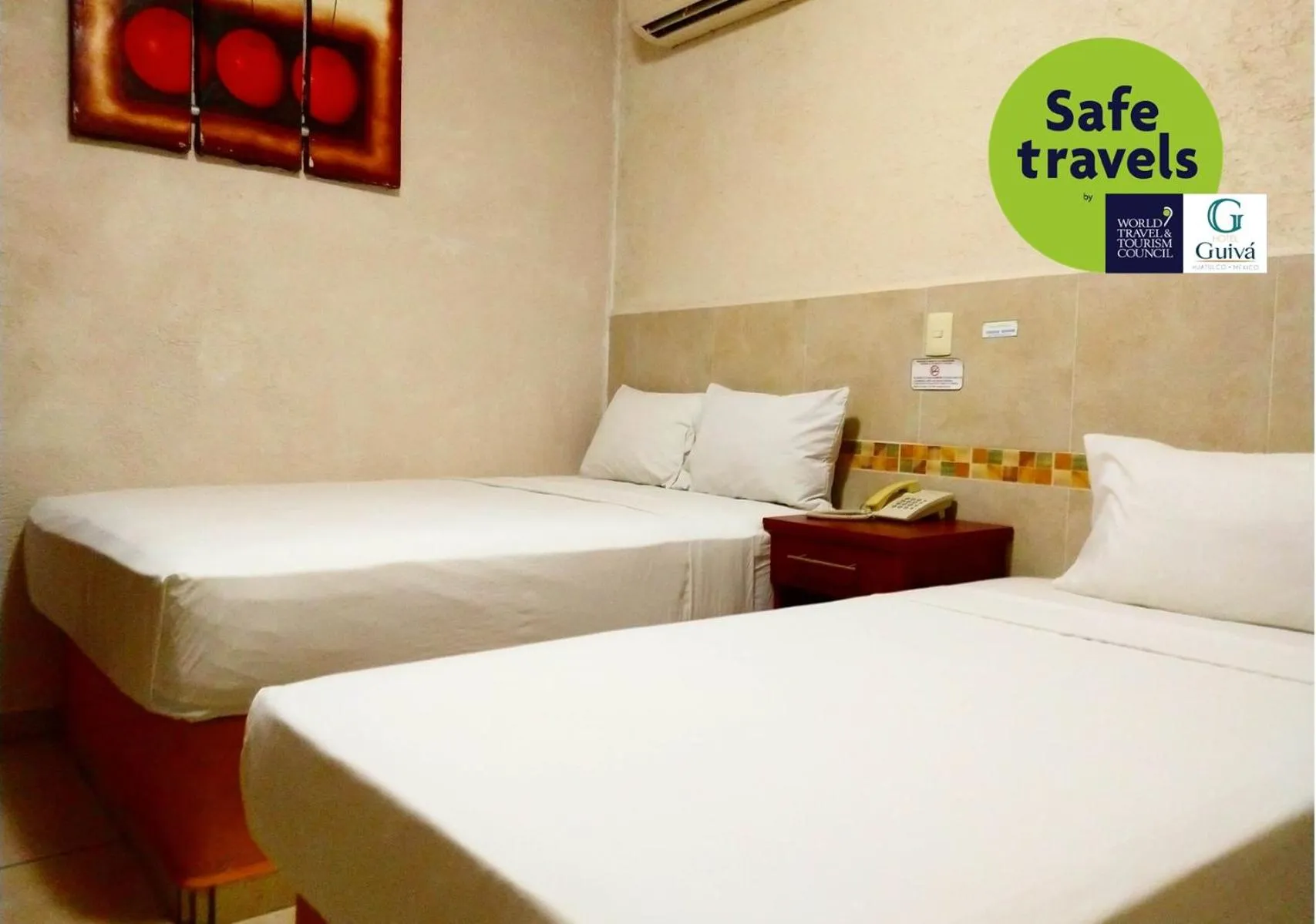 Bed in Hotel Guivá Huatulco