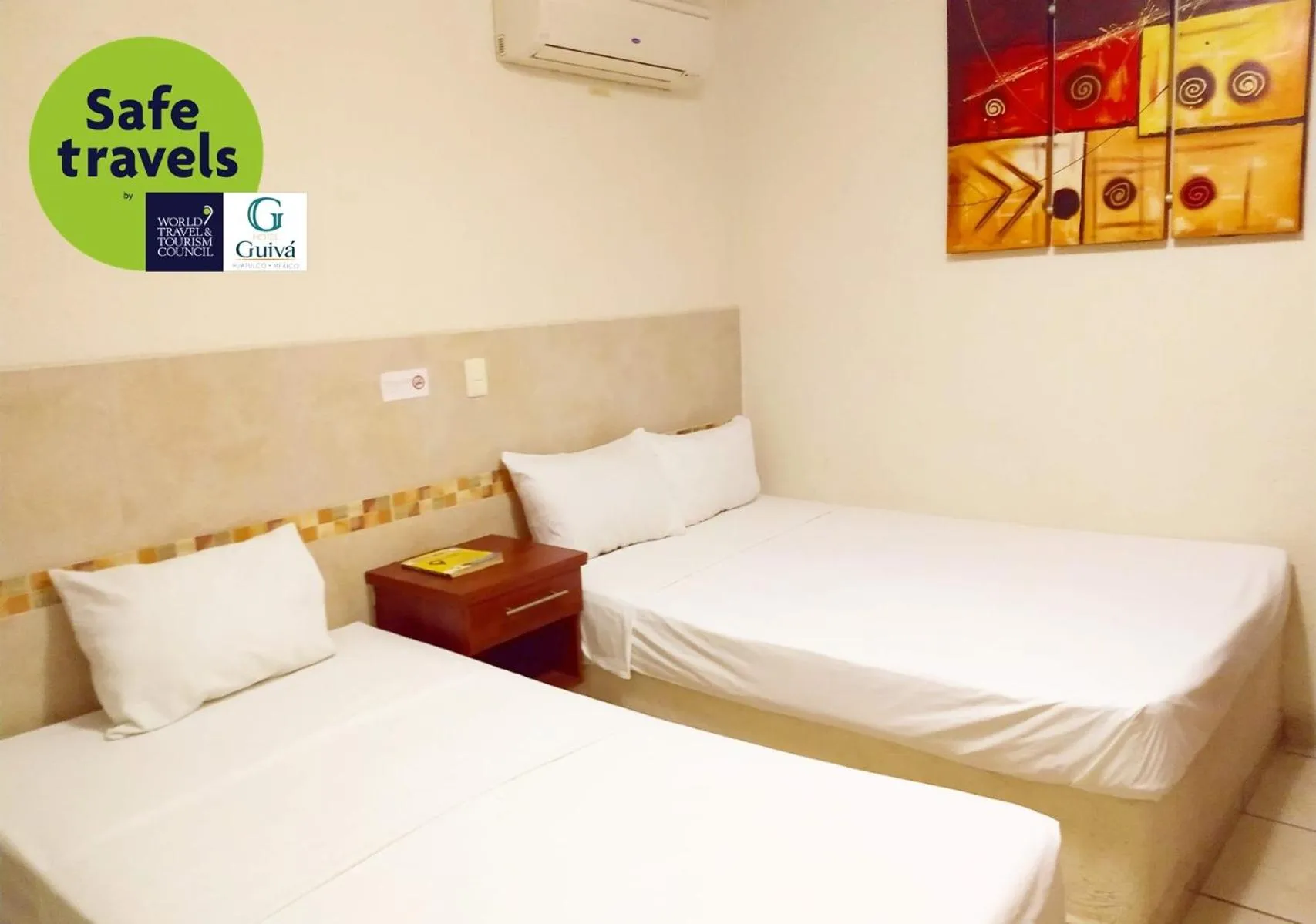 Bed in Hotel Guivá Huatulco