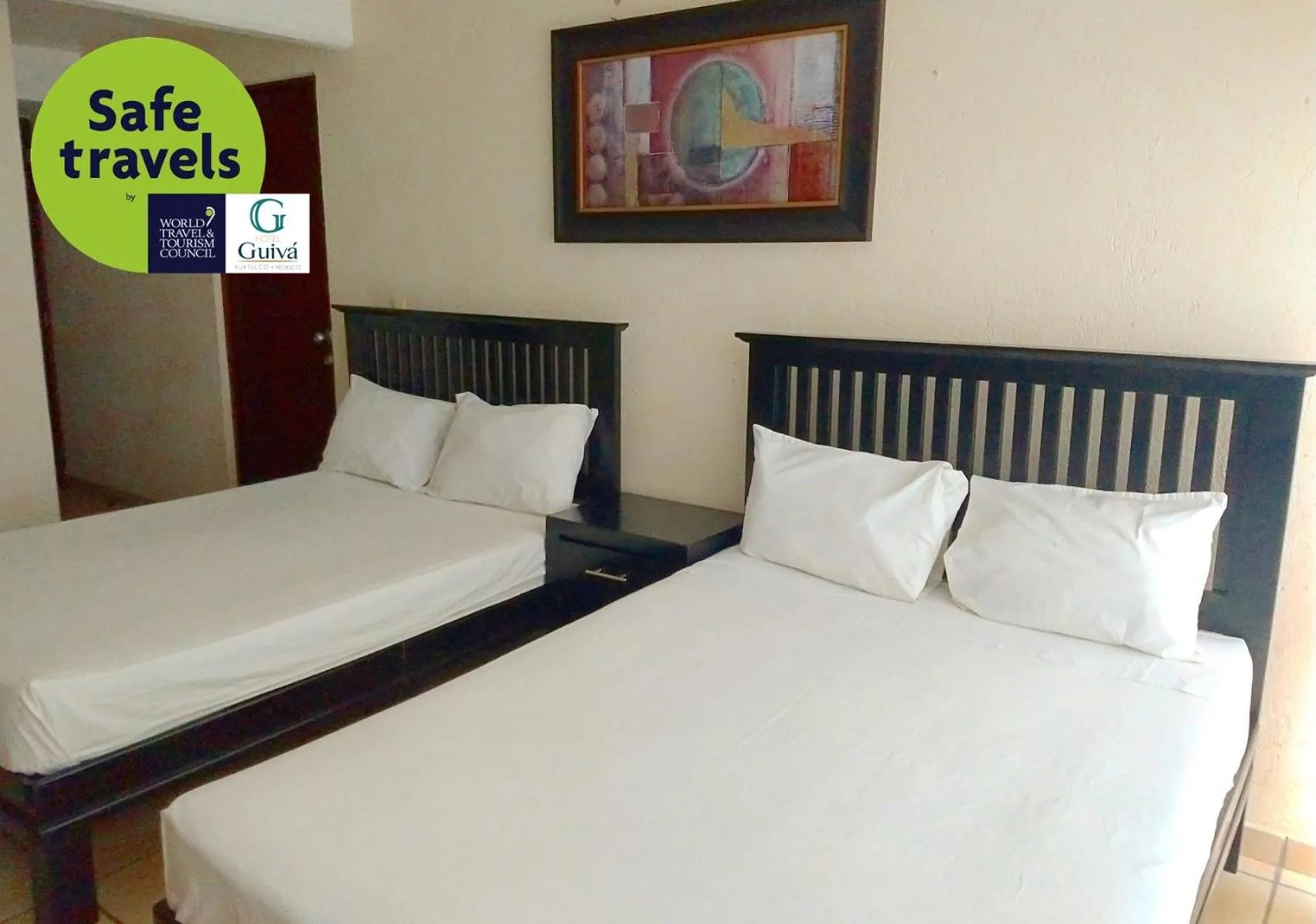 Bed in Hotel Guivá Huatulco