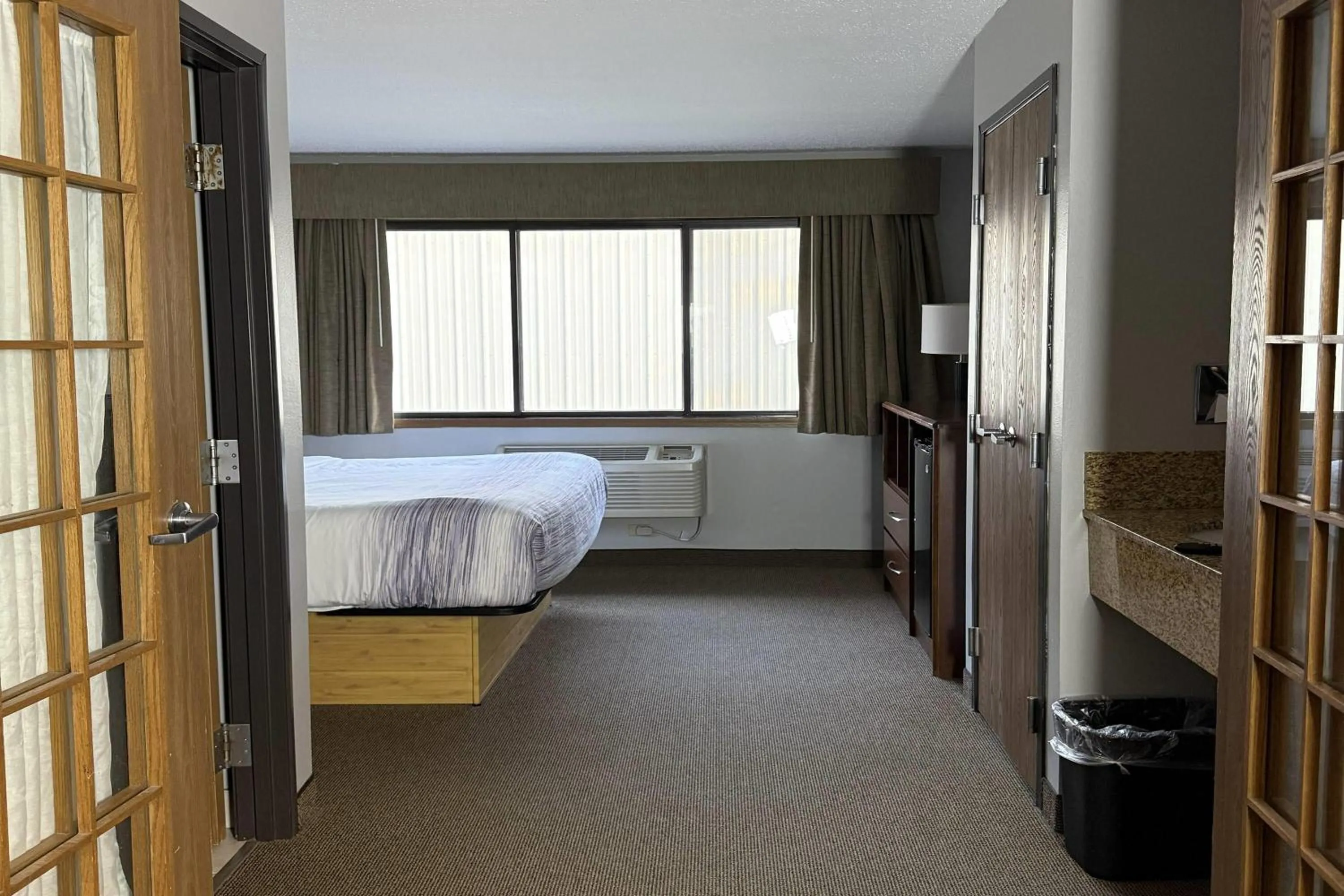 Photo of the whole room, Bed in AmericInn by Wyndham Sioux Falls
