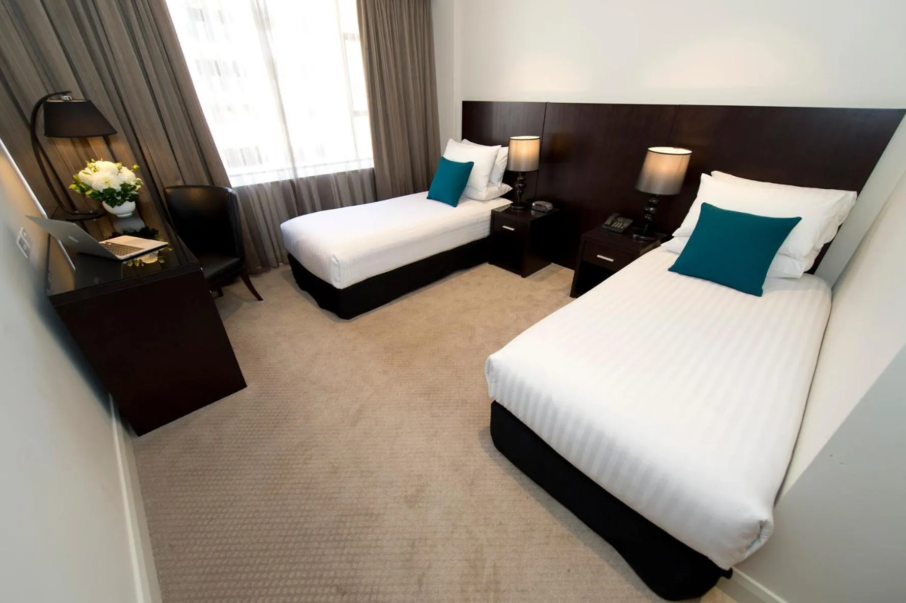 Bed in Canberra Rex Hotel